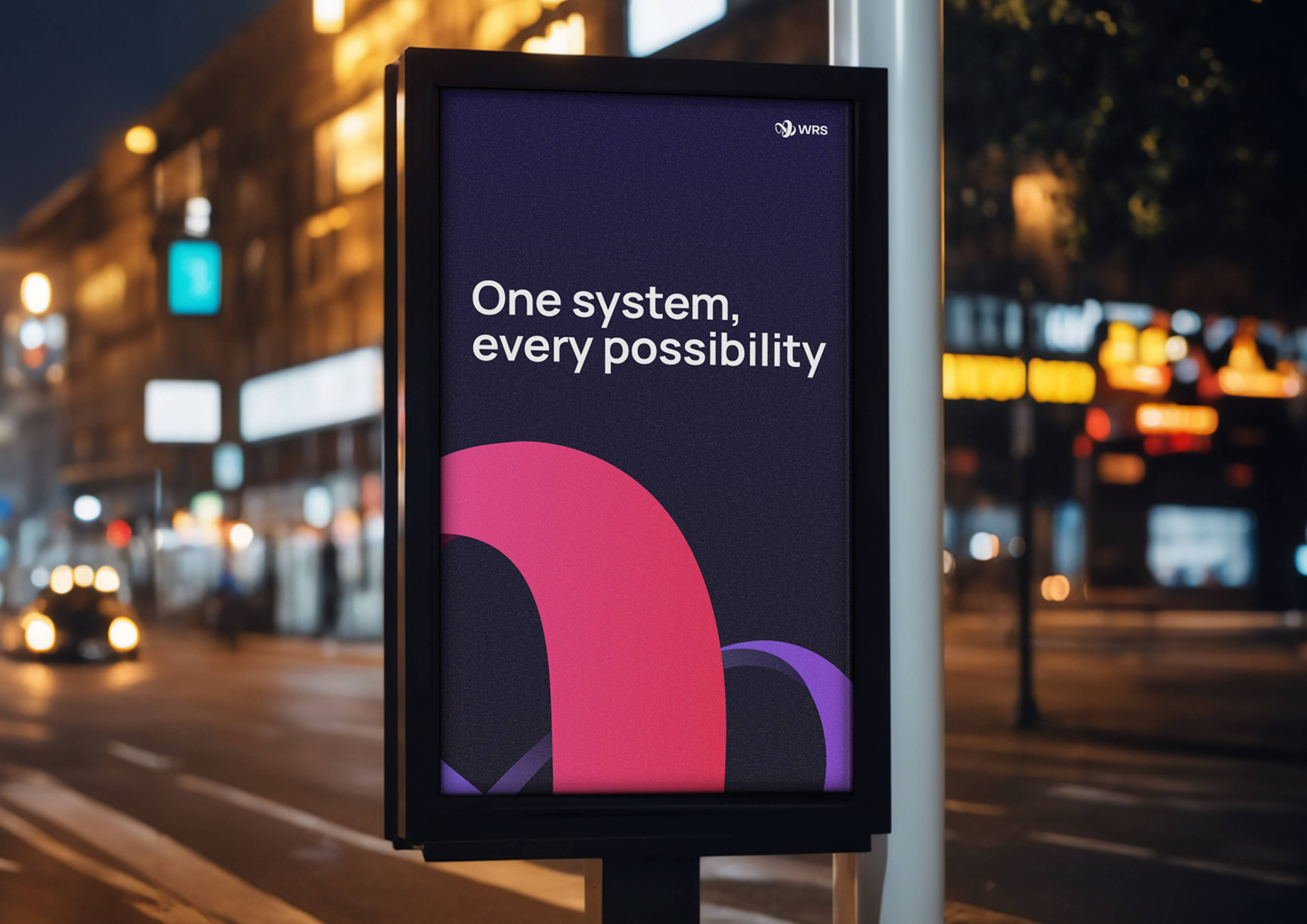 Night-time billboard mockup for WRS featuring their dynamic curved icon and brand messaging.