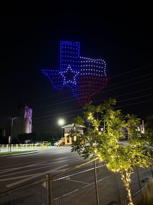 Texas-shaped lights above the Kscope25 event venue.