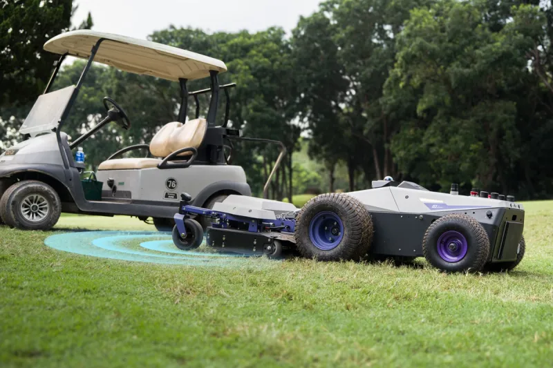 PANDAG G1 commercial robotic mower detecting obstacles on a golf course