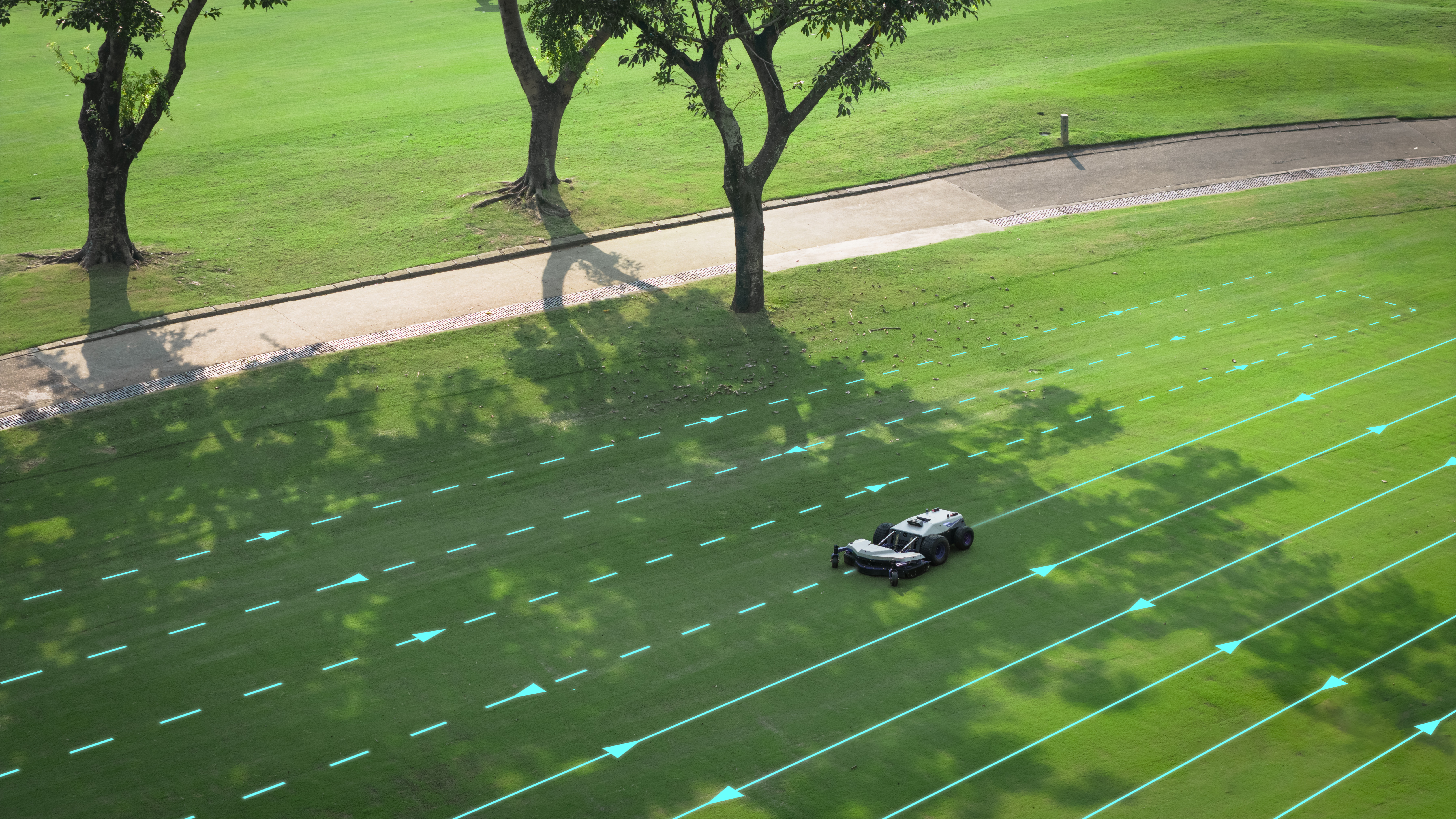 PANDAG G1 commercial robotic mower mowing rough areas on a golf course