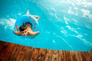 Child using inflatable ring