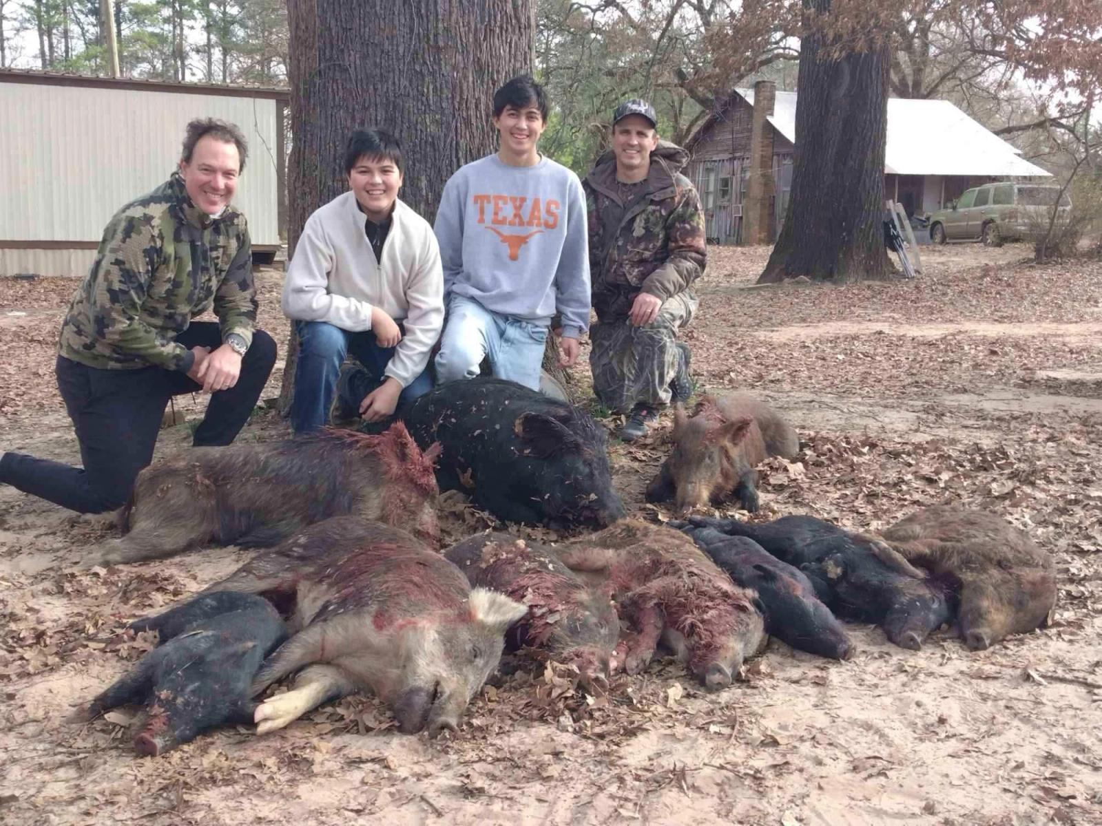 Group Hog Hunt Harvest at Boggy Creek Outfitters in Bivins, Texas