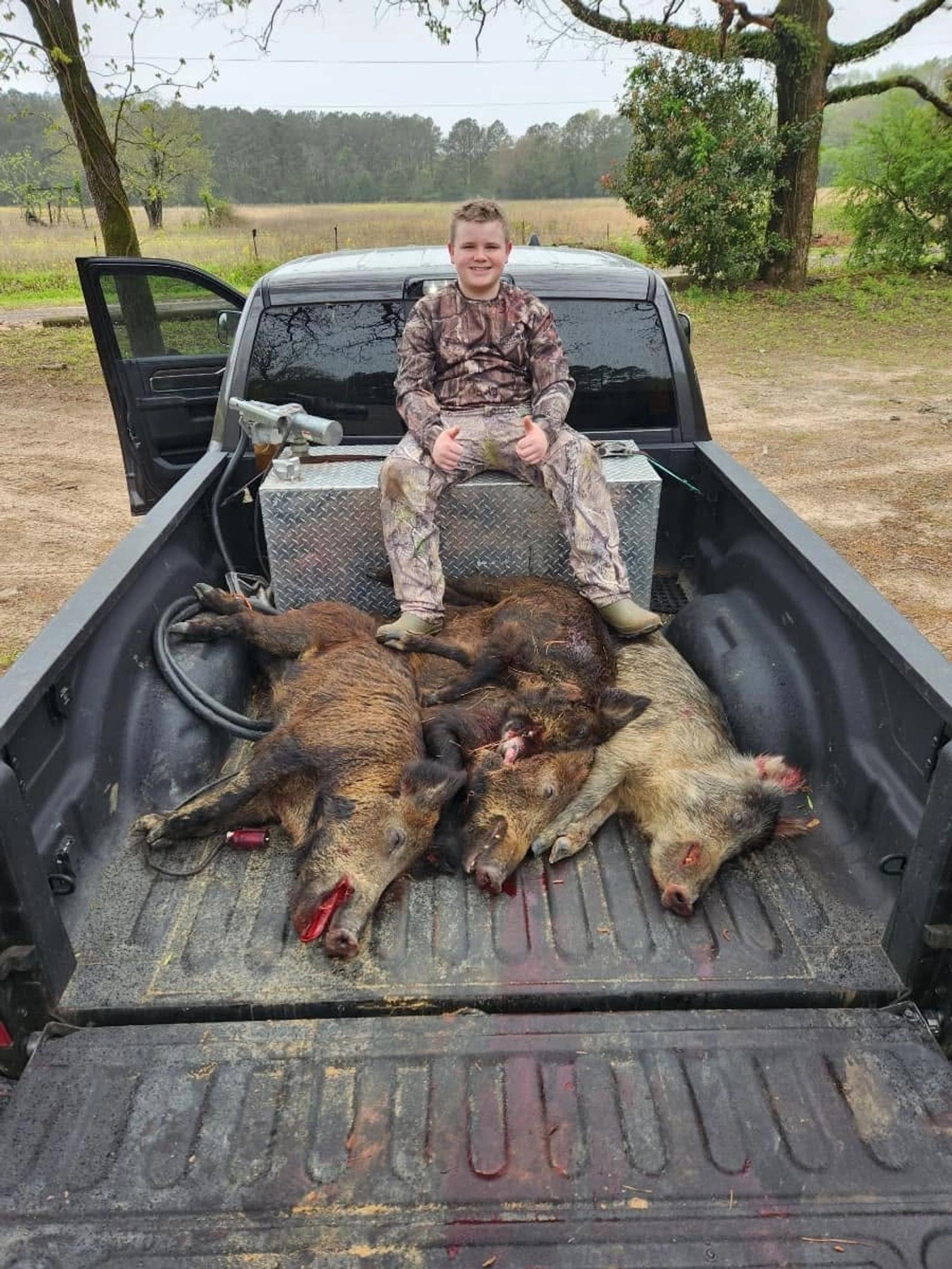 Hog Hunt Truck Harvest at Boggy Creek Outfitters in Bivins, Texas