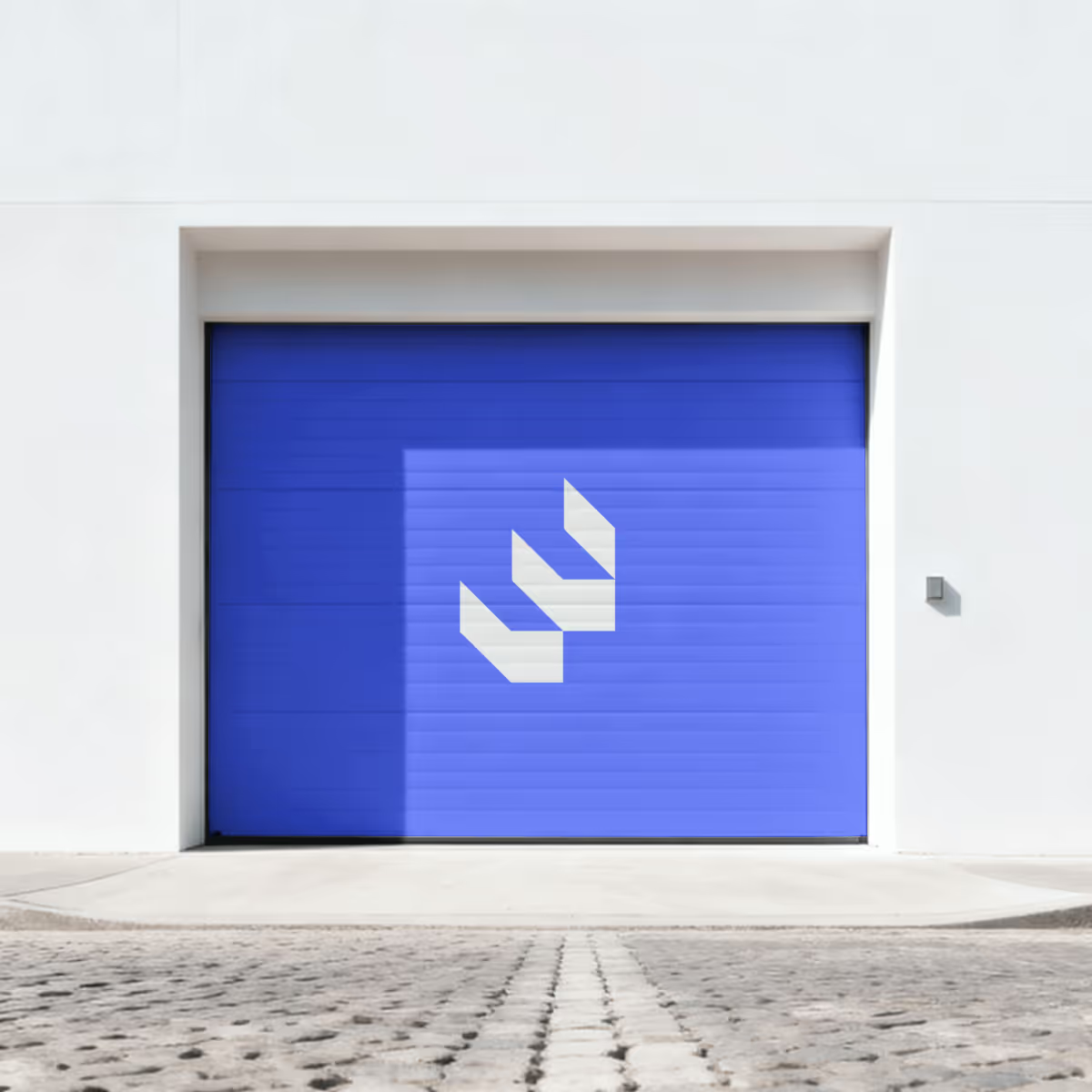 Prosper Development logo on a warehouse door, showing the brand identity applied on site.