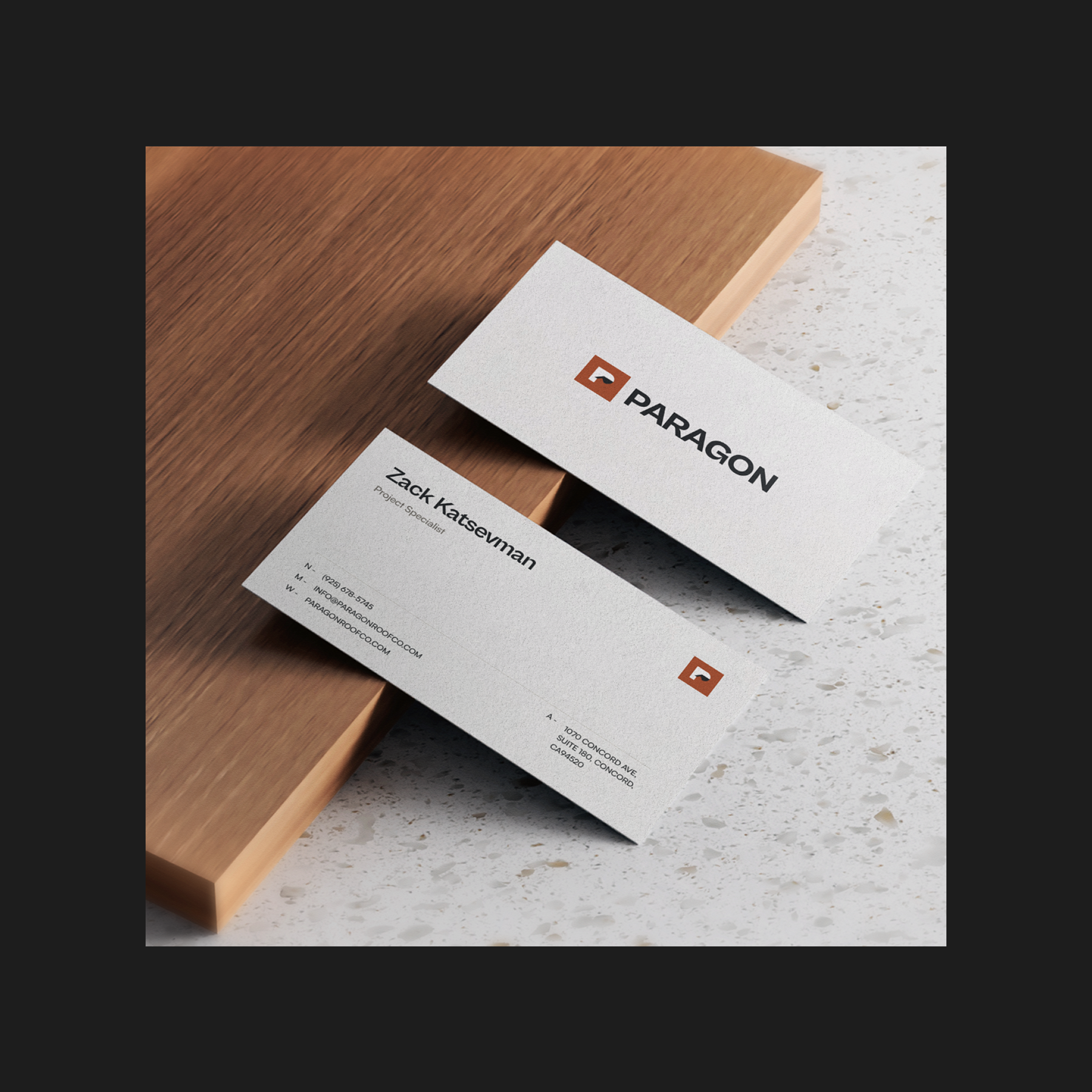Paragon Roofing business cards designed by VX.STUDIO with the brand identity.