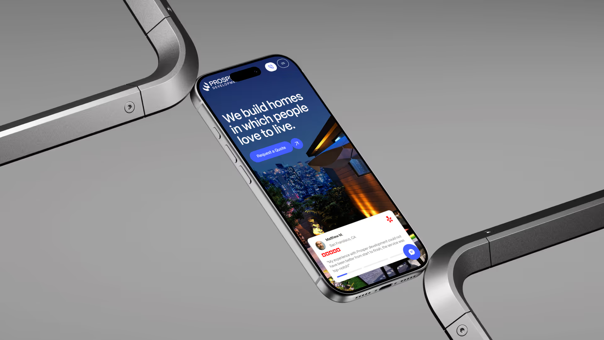Prosper Development homepage hero on a phone.