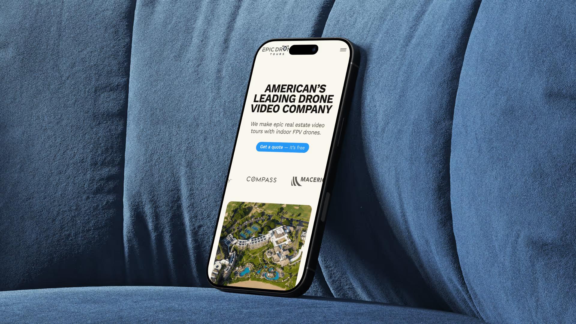 Epic Drone Tours homepage hero on mobile, with aerial drone footage behind the headline.