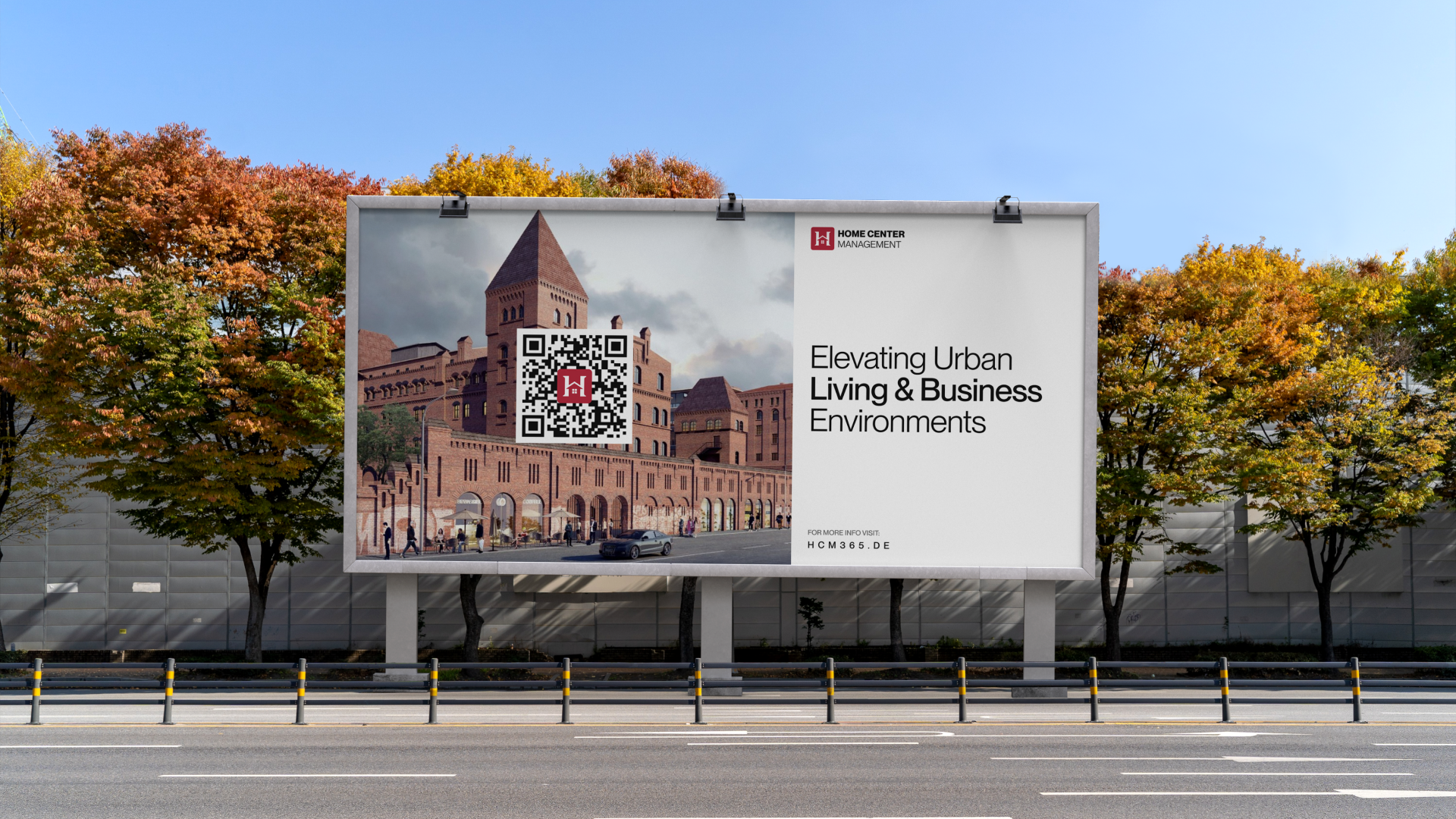 HCM billboard mockup designed by VX.STUDIO, showing the brand identity applied to outdoor advertising.