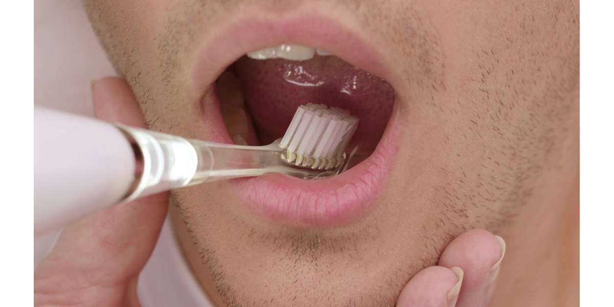 Active Oral Clean tannbørste med sug