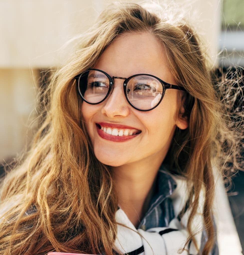 bespectacled smiling lady