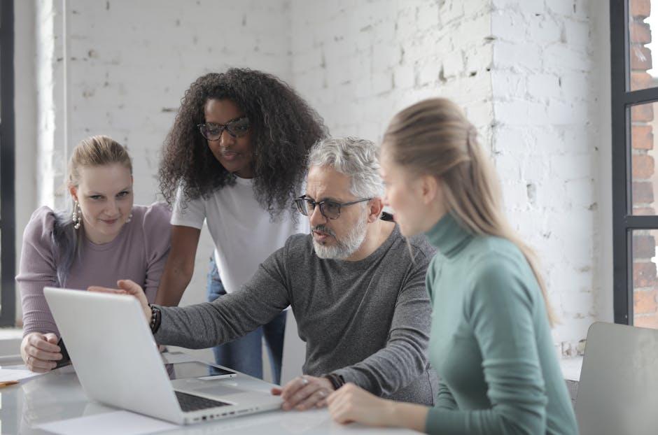 diverse team of developers in a New York City office - NYC App Development Agency: How to Choose the Right Development Partner