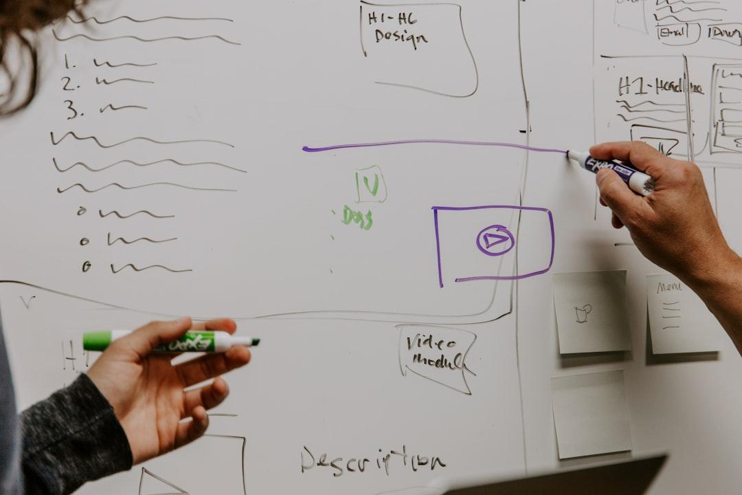 illustrating the concept of rapid prototyping an MVP on a whiteboard - How Rork AI Compares to Other No-Code AI Builders