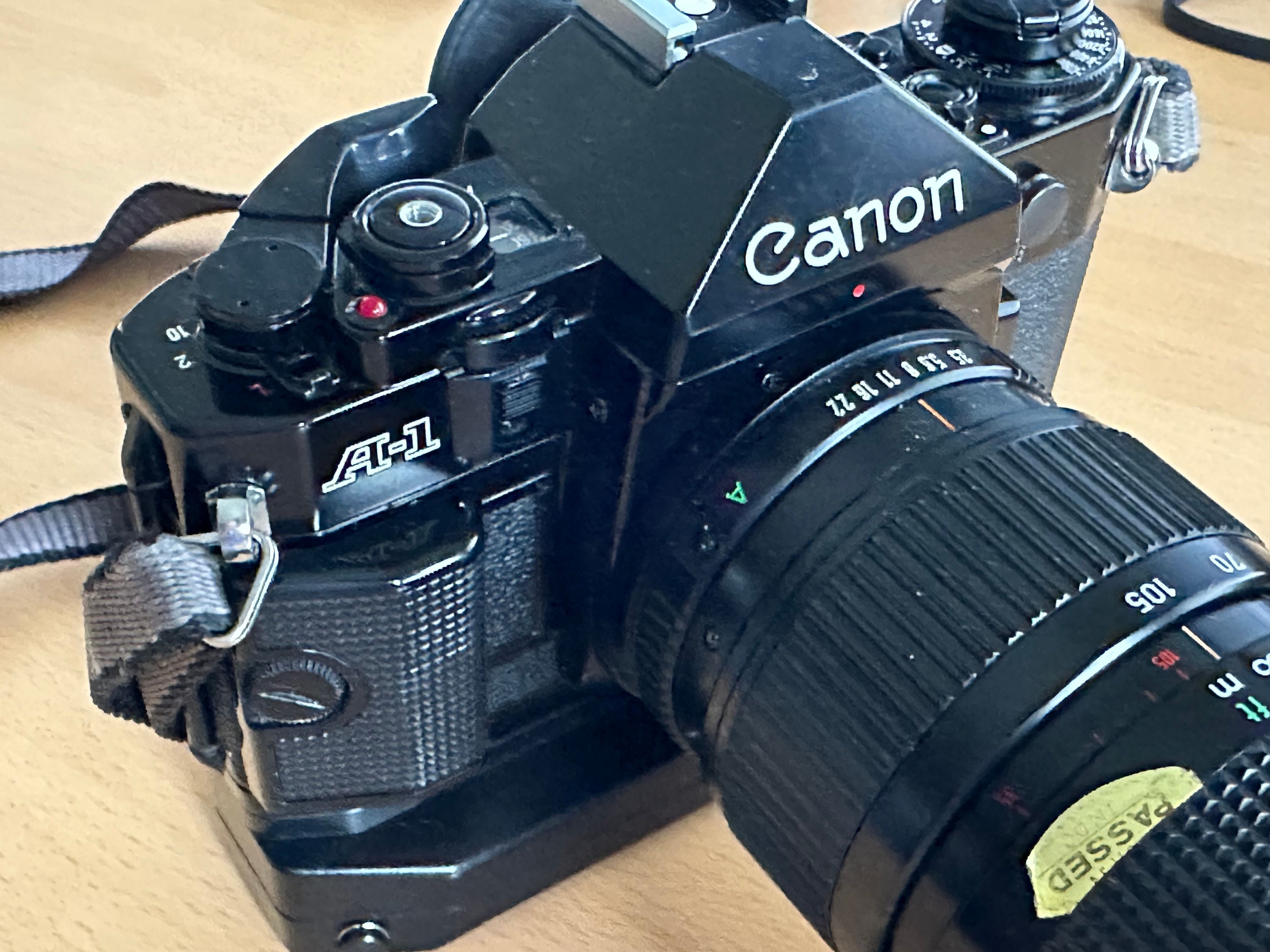 A Canon A1 35 mm camera with a zoom lens