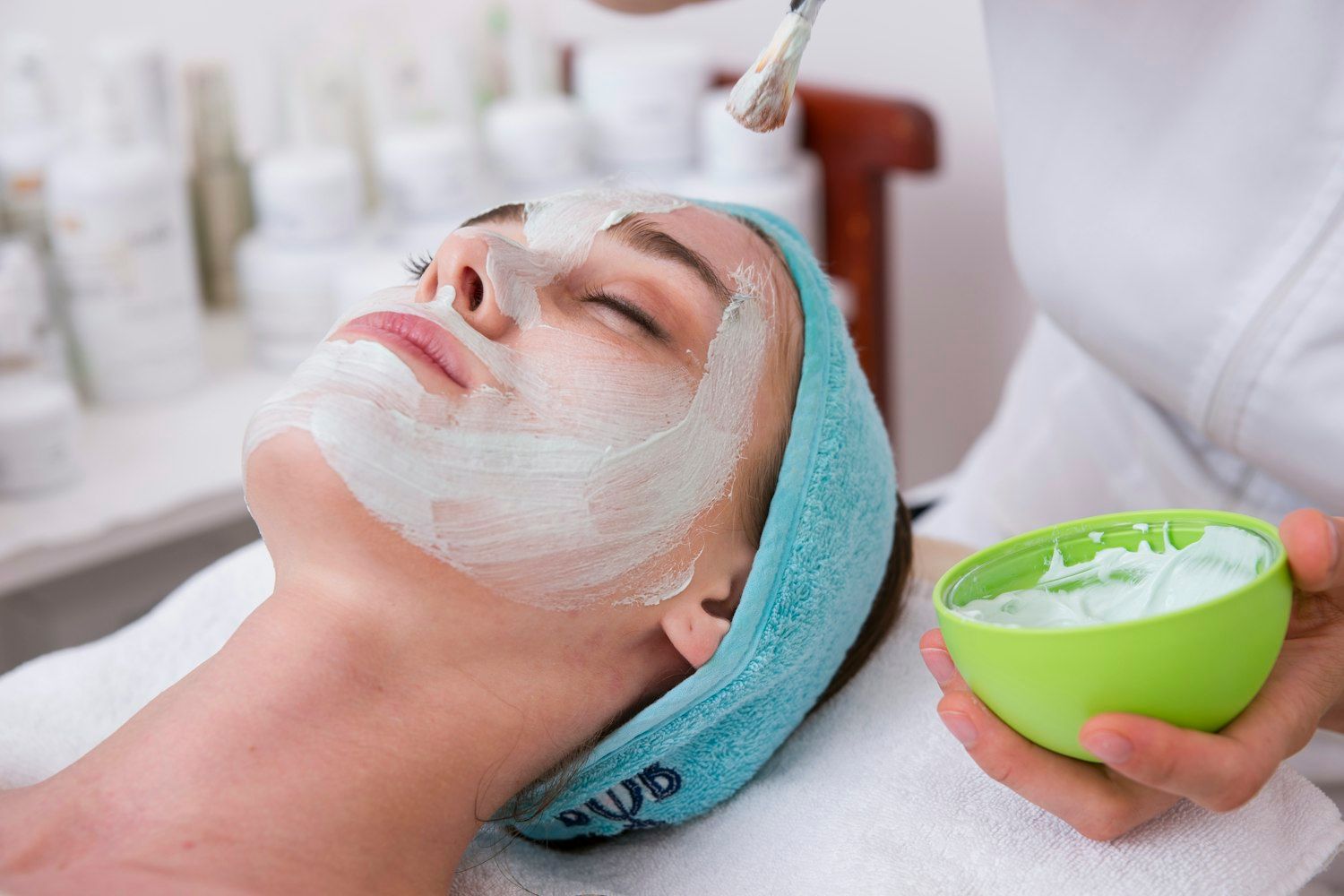 A client receiving a facial treatment at Beauty at Slade