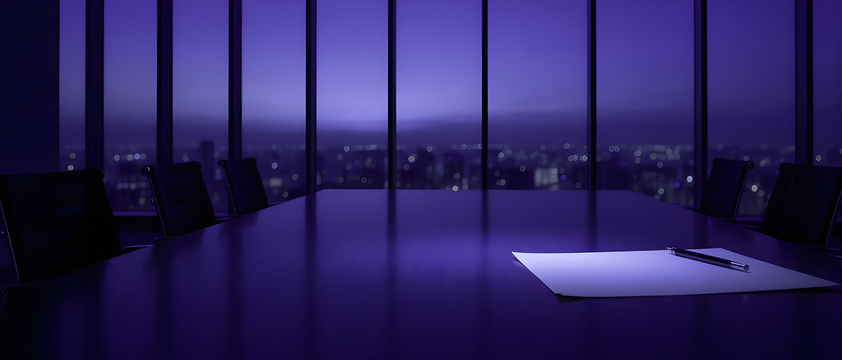 An empty boardroom at dusk, a single document lit on the table