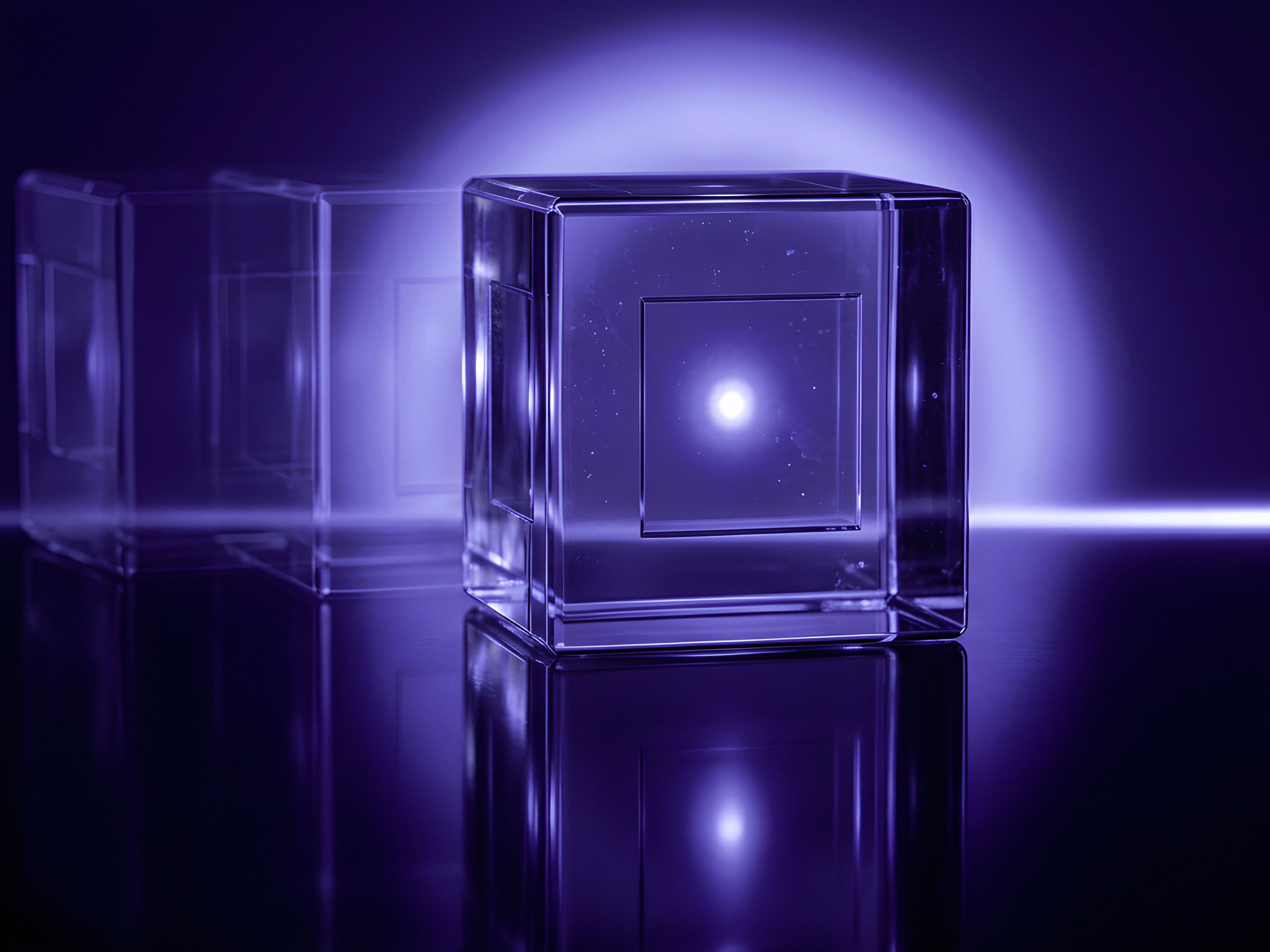 A glass cube lit from within, set apart from a row of faded cubes behind it.