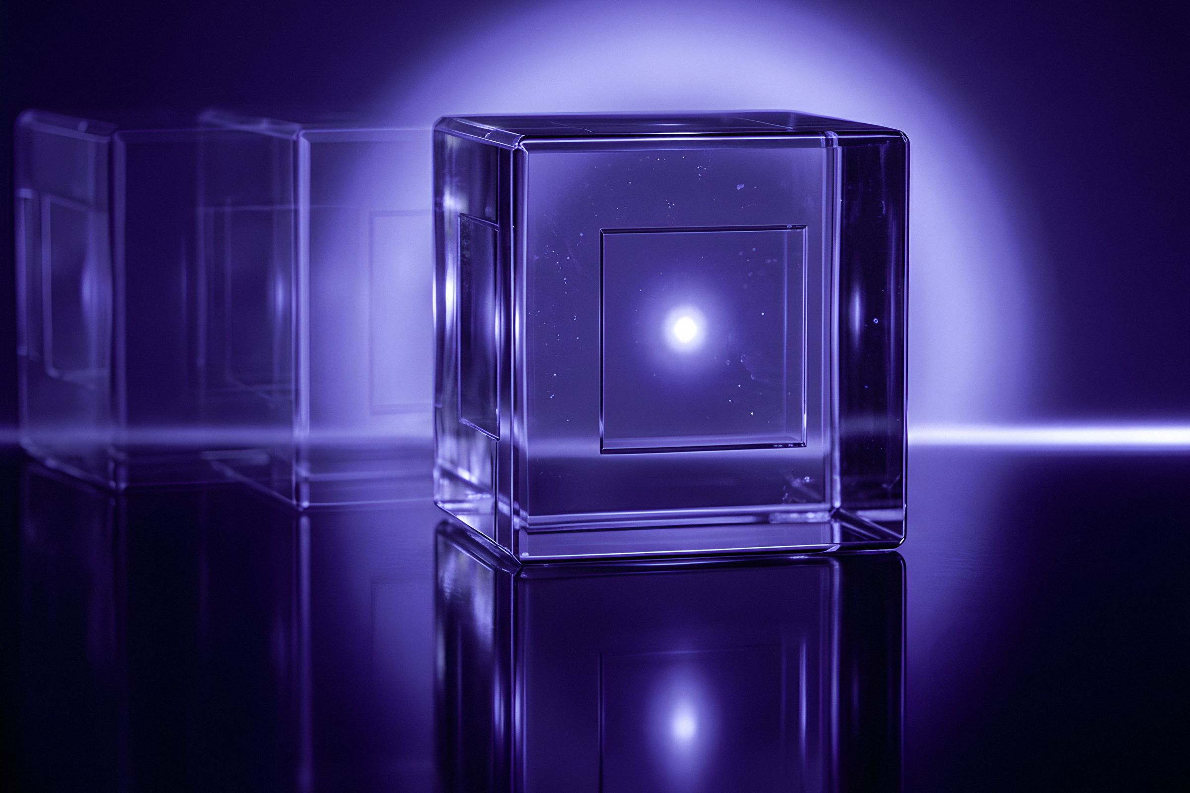 A glass cube lit from within, set apart from a row of faded cubes behind it.
