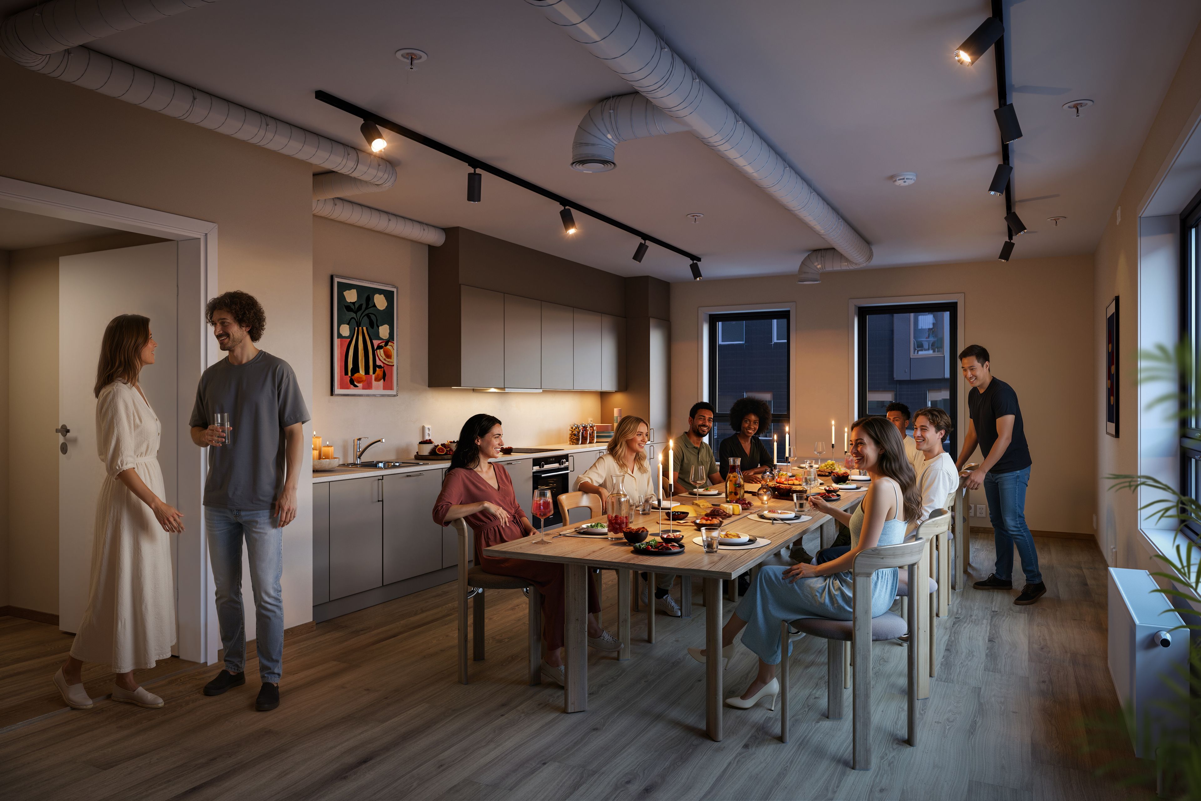 Flere mennesker samlet i et rom, rundt et bord med mat