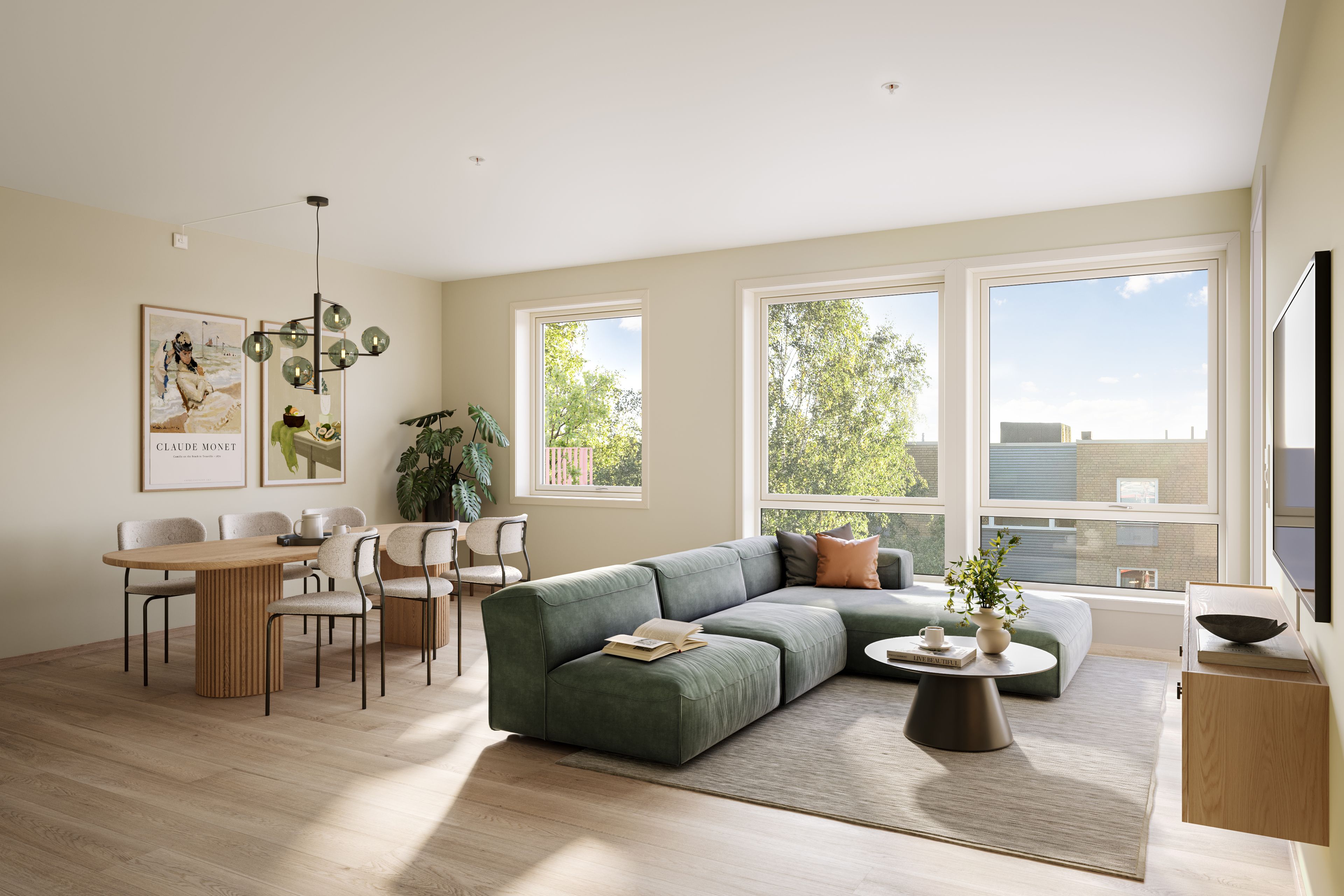 Innredet stue med sofa og spiseplass og og store vinduer.