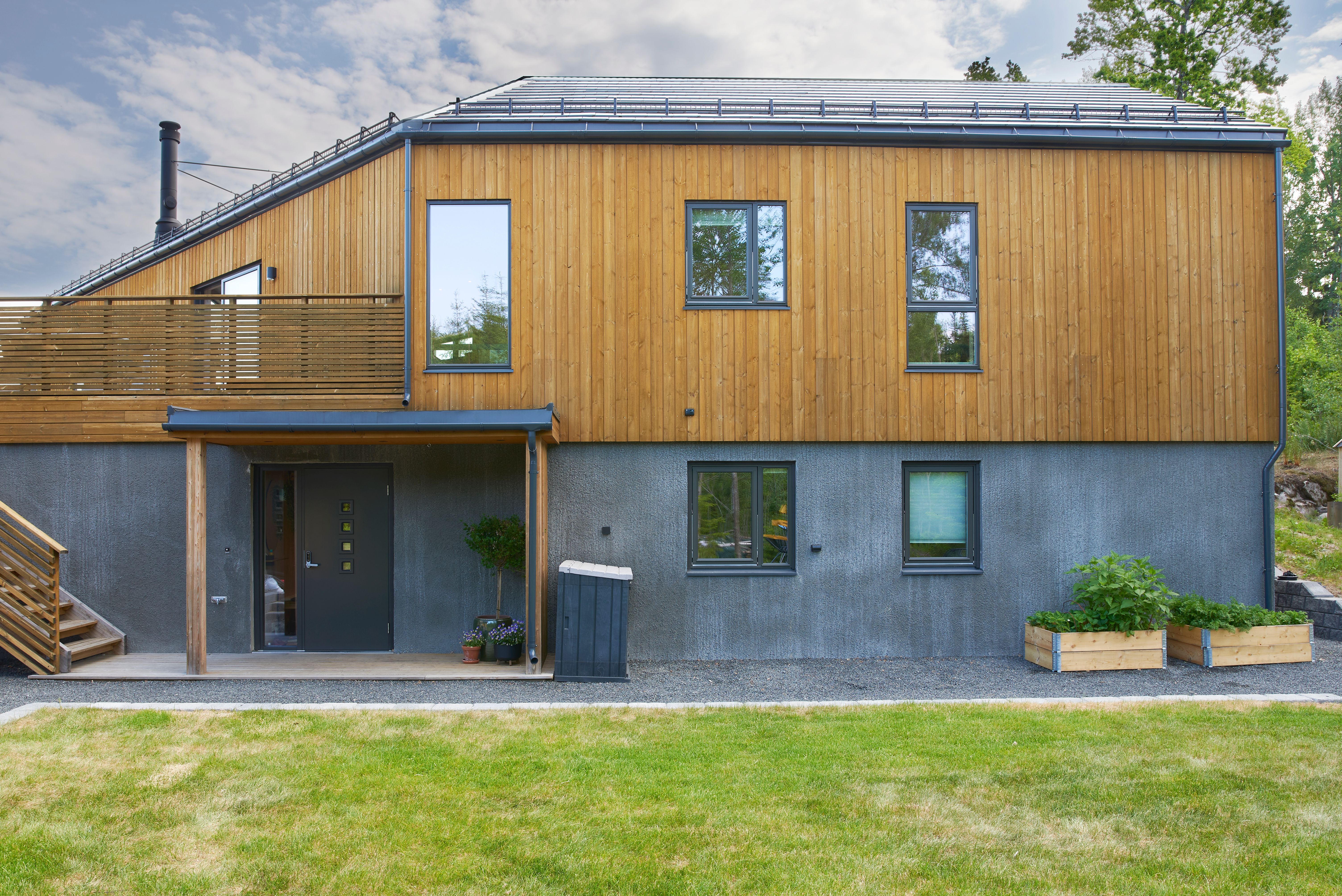 Foto av fasade og inngang til enebolig bygget av OBOS Block Watne Enebolig i Nærsnes, Asker