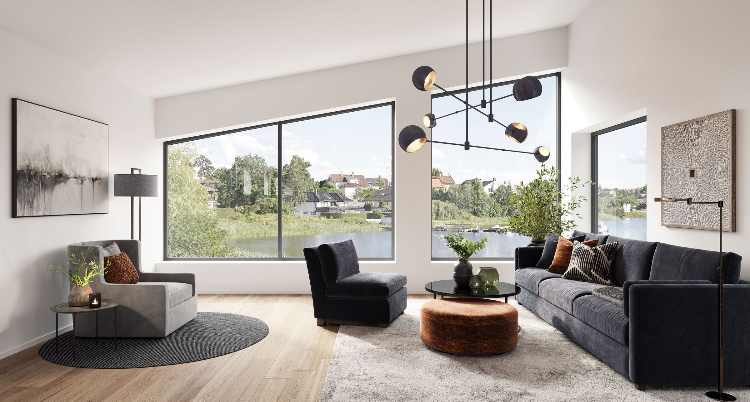 Dette er et moderne hus med store vinduer som gir godt med lys inn i boligen, og skaper nærhet til omgivelsene rundt.