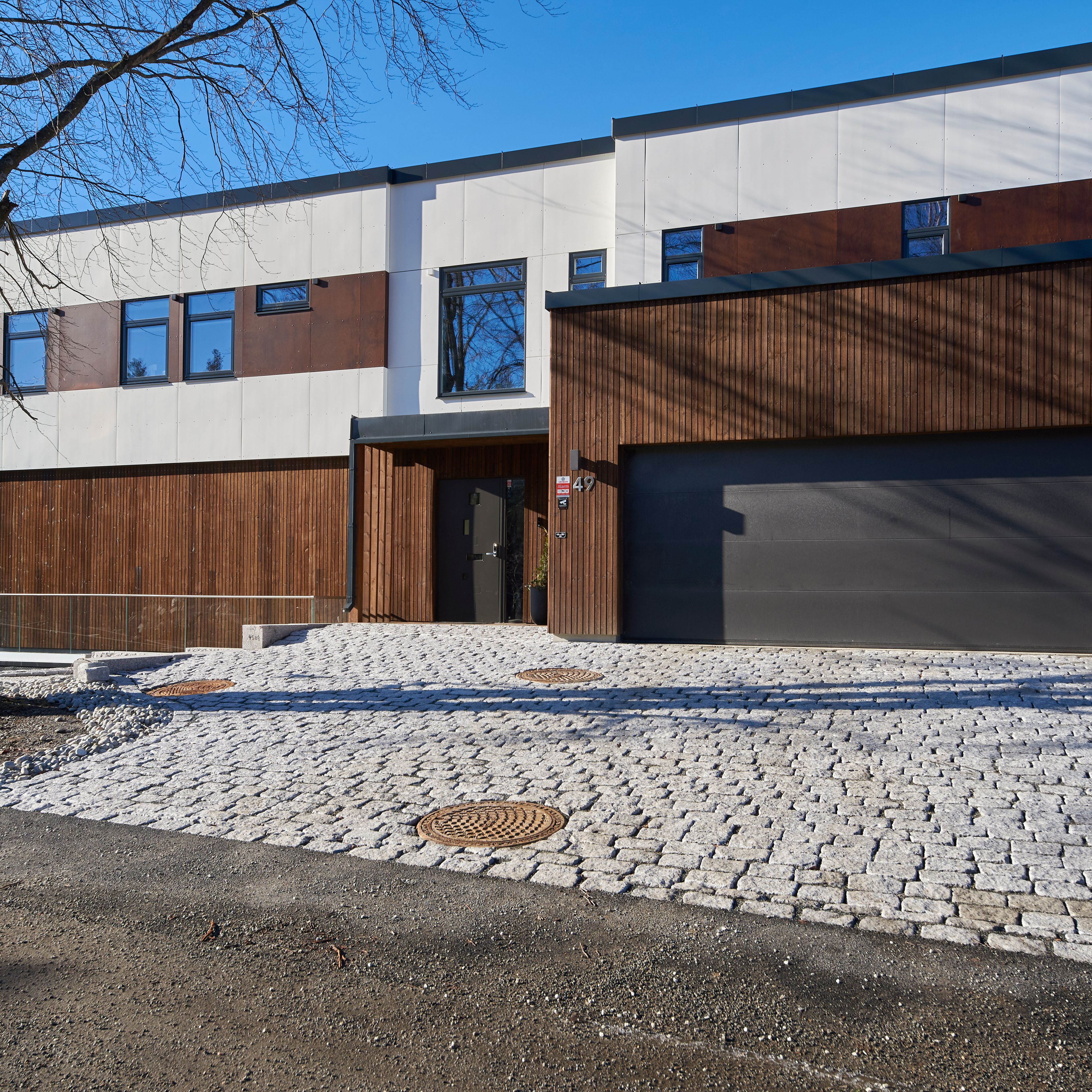 Foto av fasade på enebolig på Sofiemyr i Nordre Follo