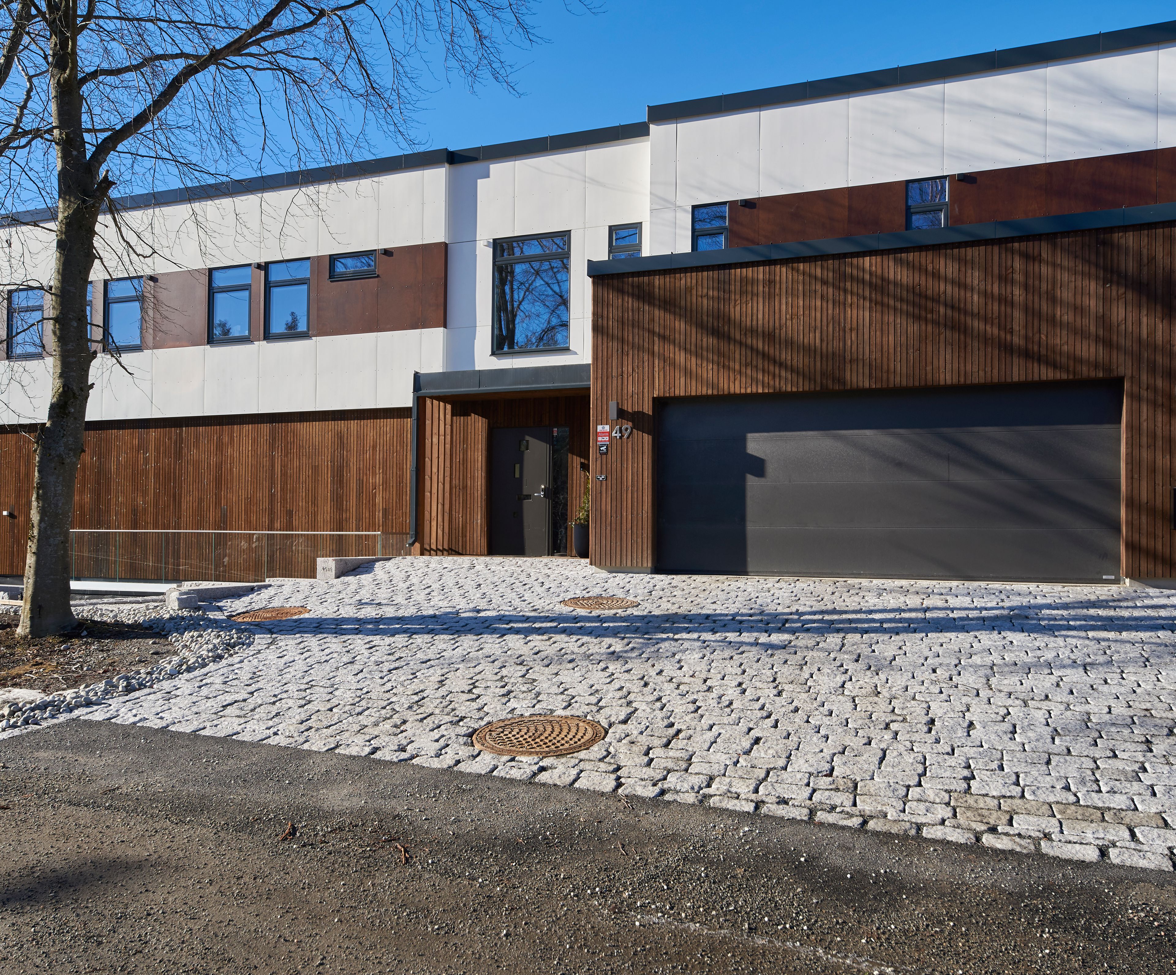 Foto av fasade på enebolig på Sofiemyr i Nordre Follo