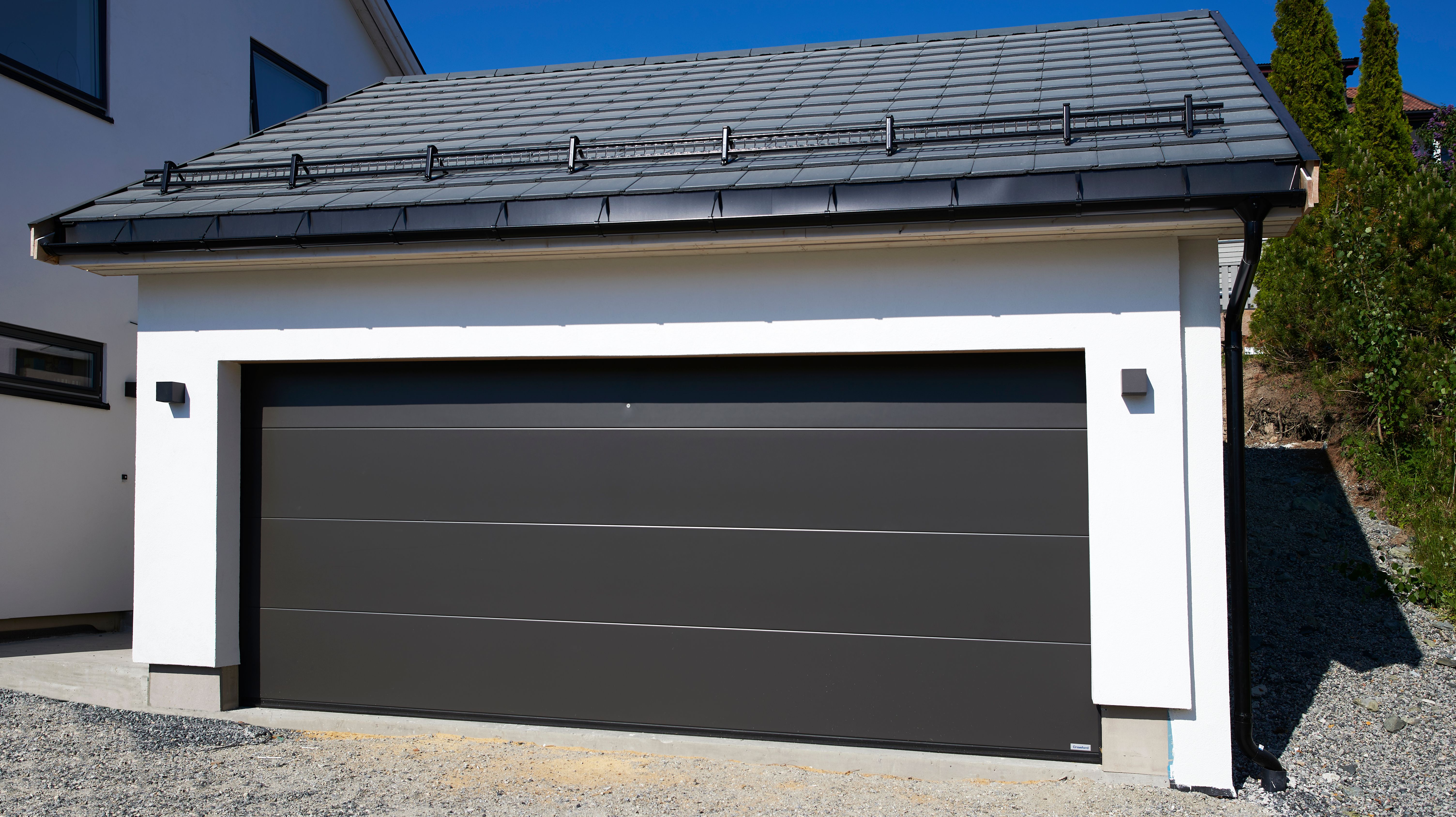 Foto av garasje ved enebolig bygget av OBOS Block Watne Eneboliger i Vestre Aker, Oslo