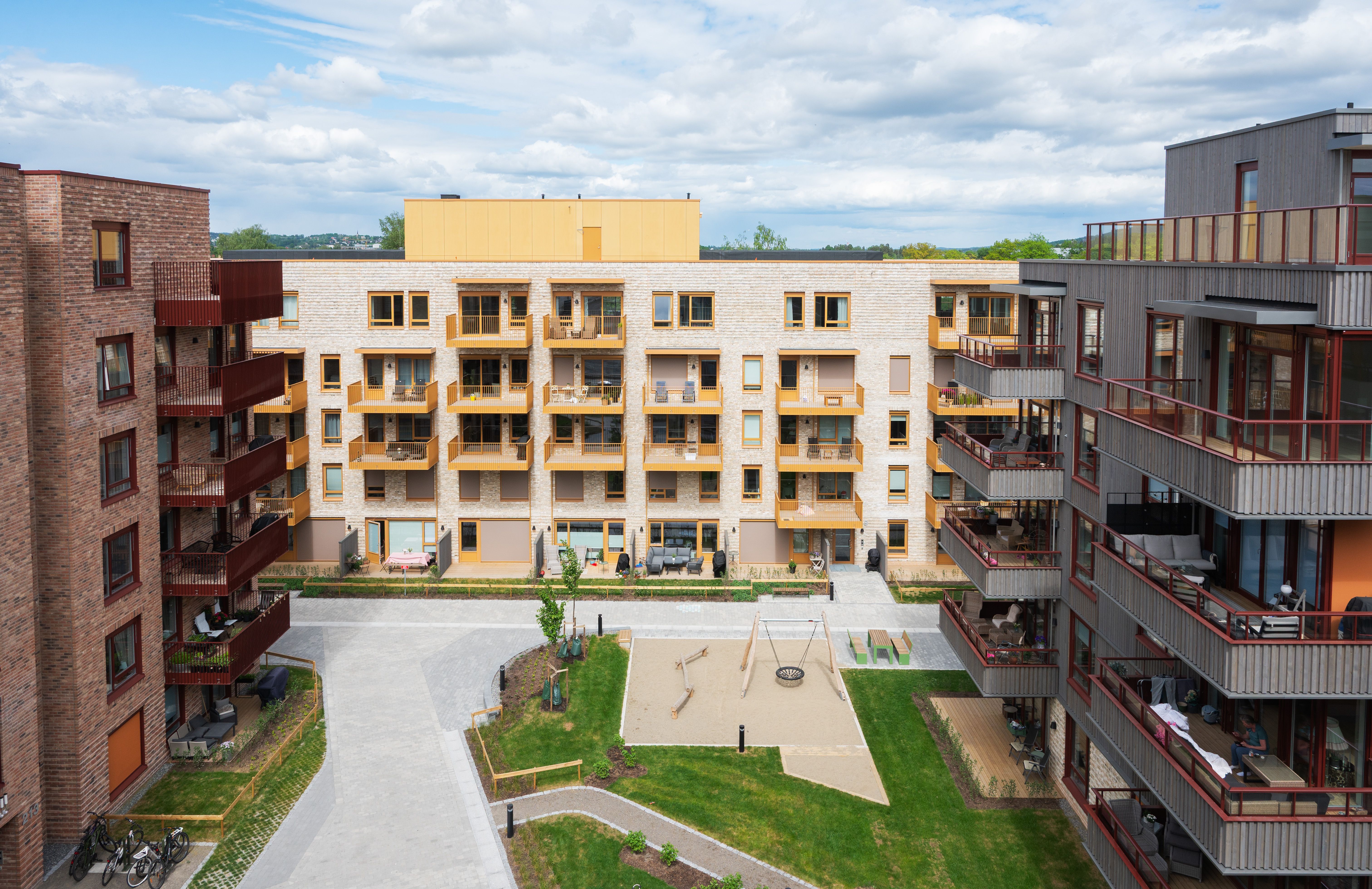 Foto av gårdsrom i boligprosjektet Parsellen, i Kvarteret, Lillestrøm.
