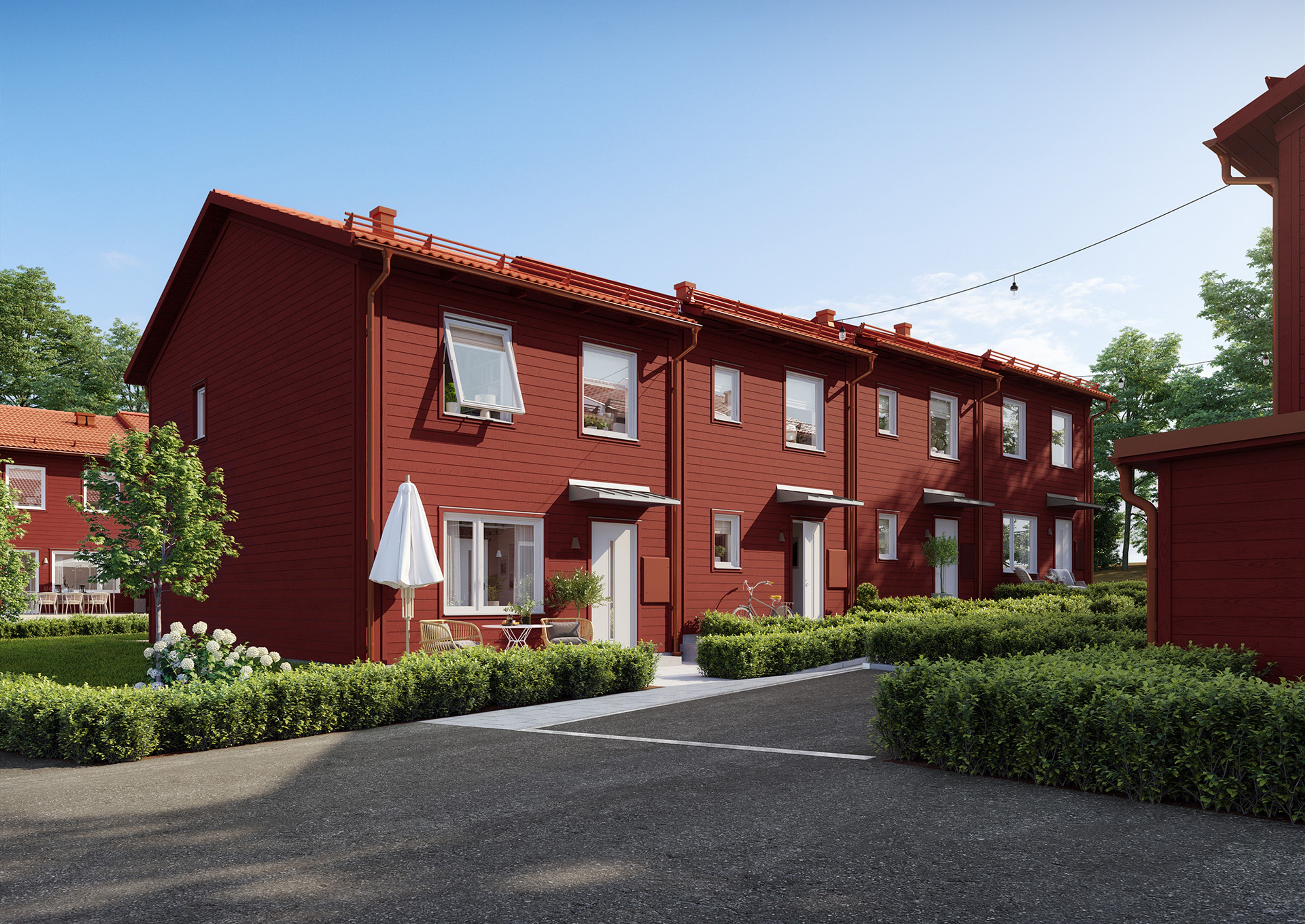 Illustration av entrésidan på en radhuslänga i röd trädfasad