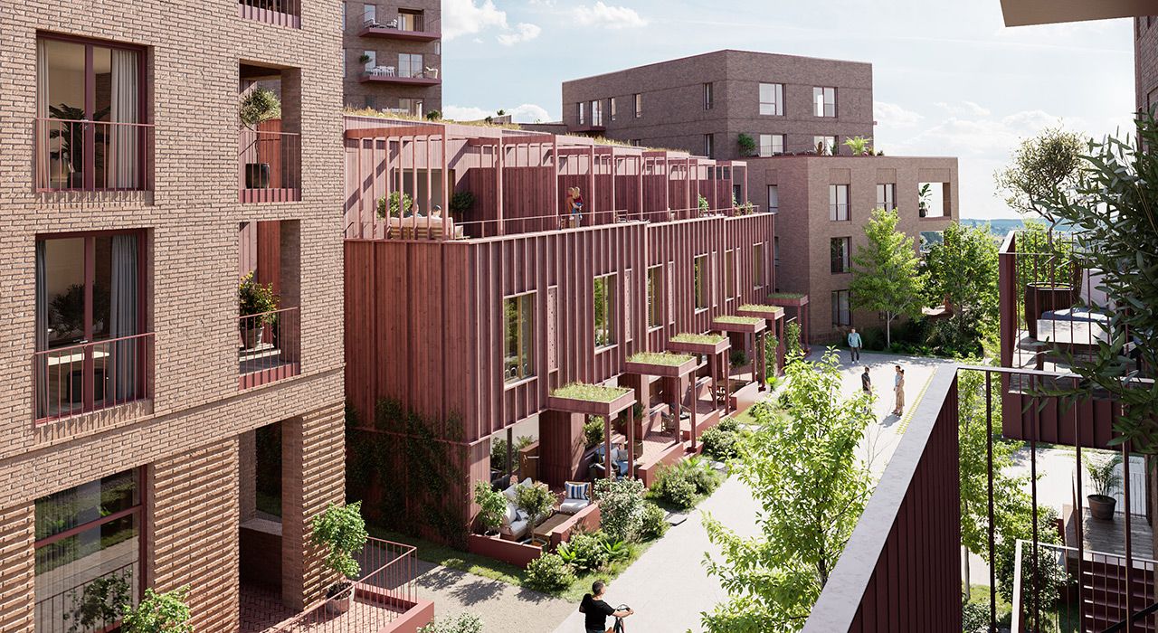 Illustrasjon av fasaden og gårdsrommet til boligprosjektet Nansenløkka, sett fra balkong på dagtid.