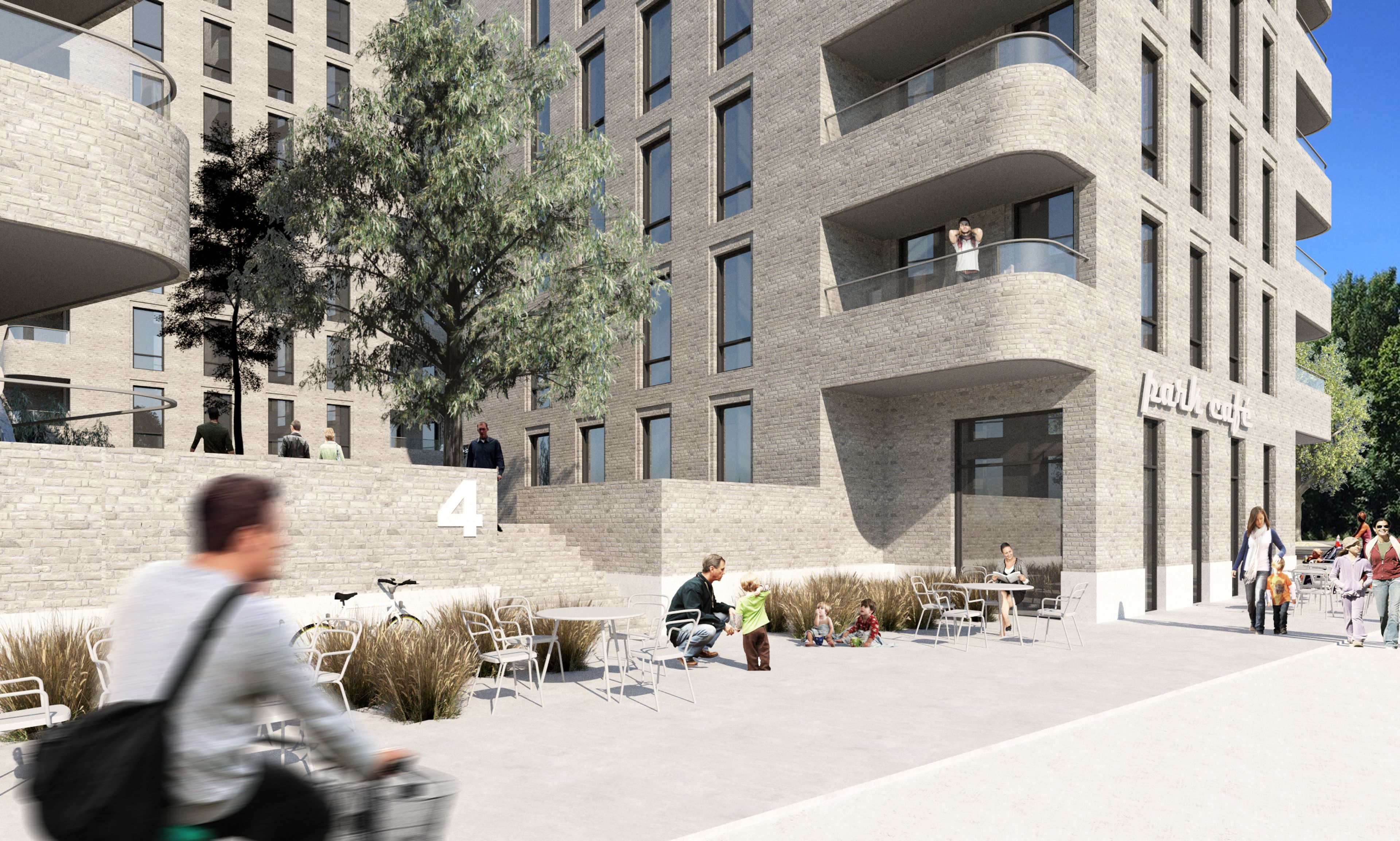 Människor i rörelse vid nybbygt hus
