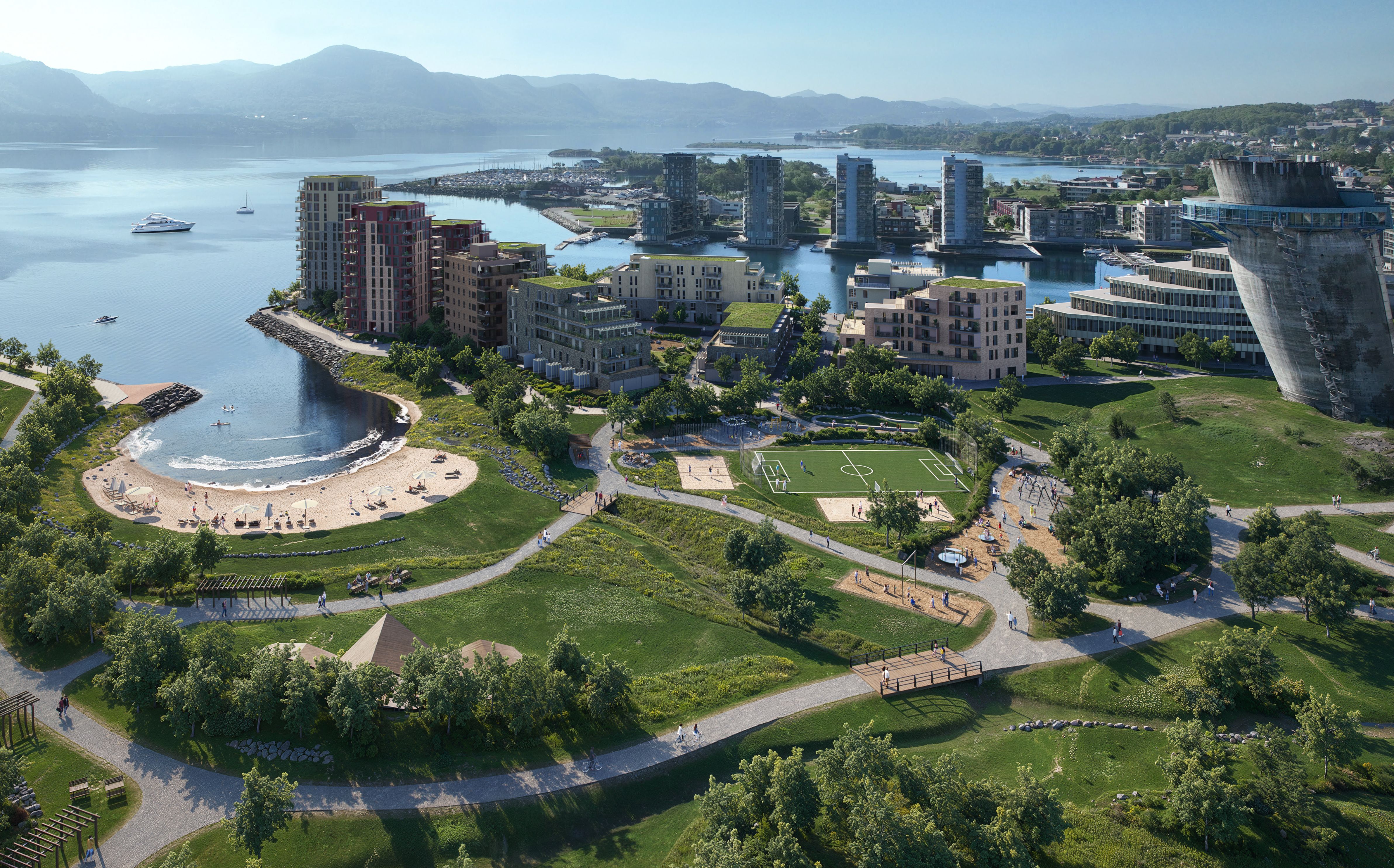 Oversiktsbilde over nabolaget med strand og grøntområder