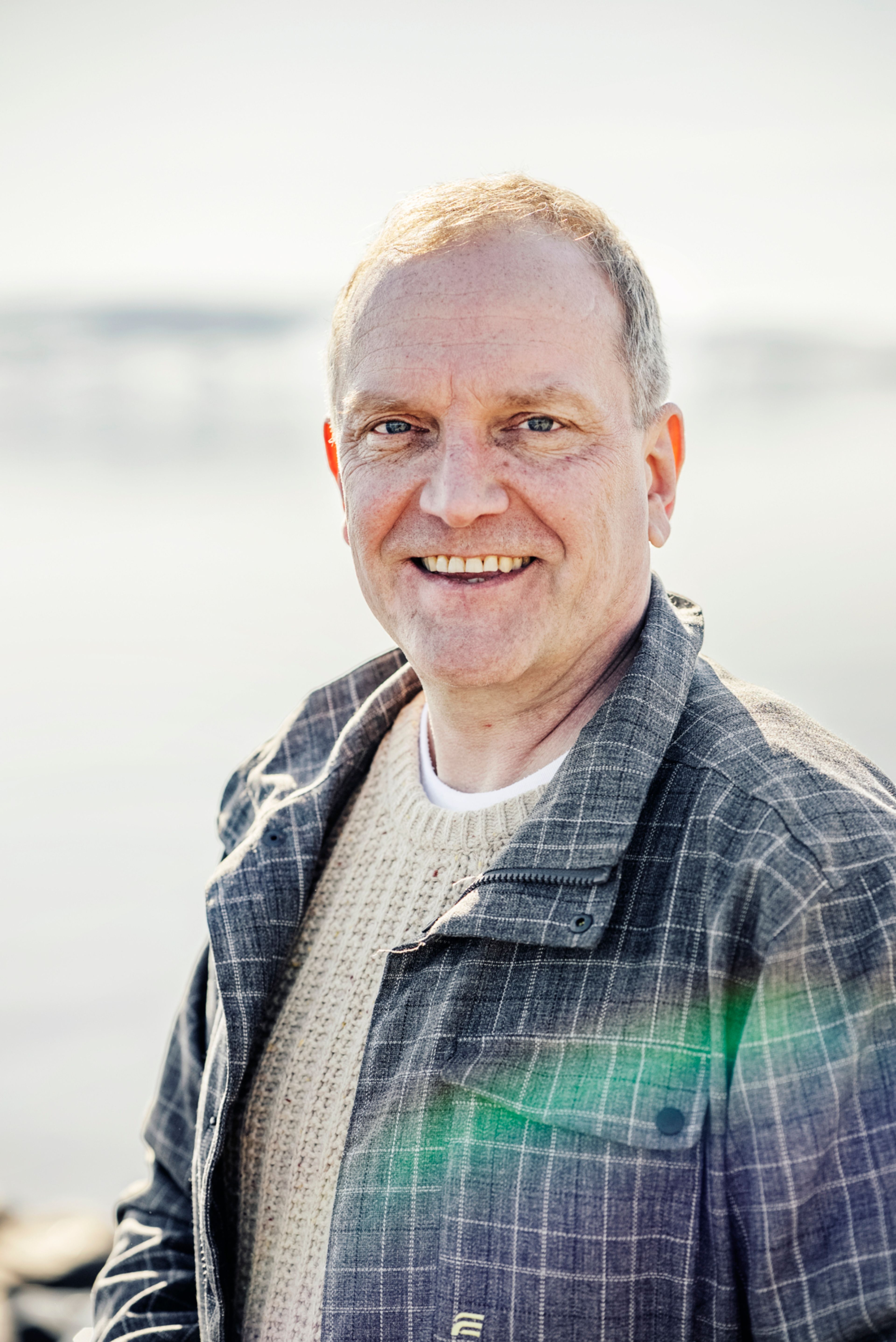 Nærbilde av Remo Martinesen som smiler til kameraet.