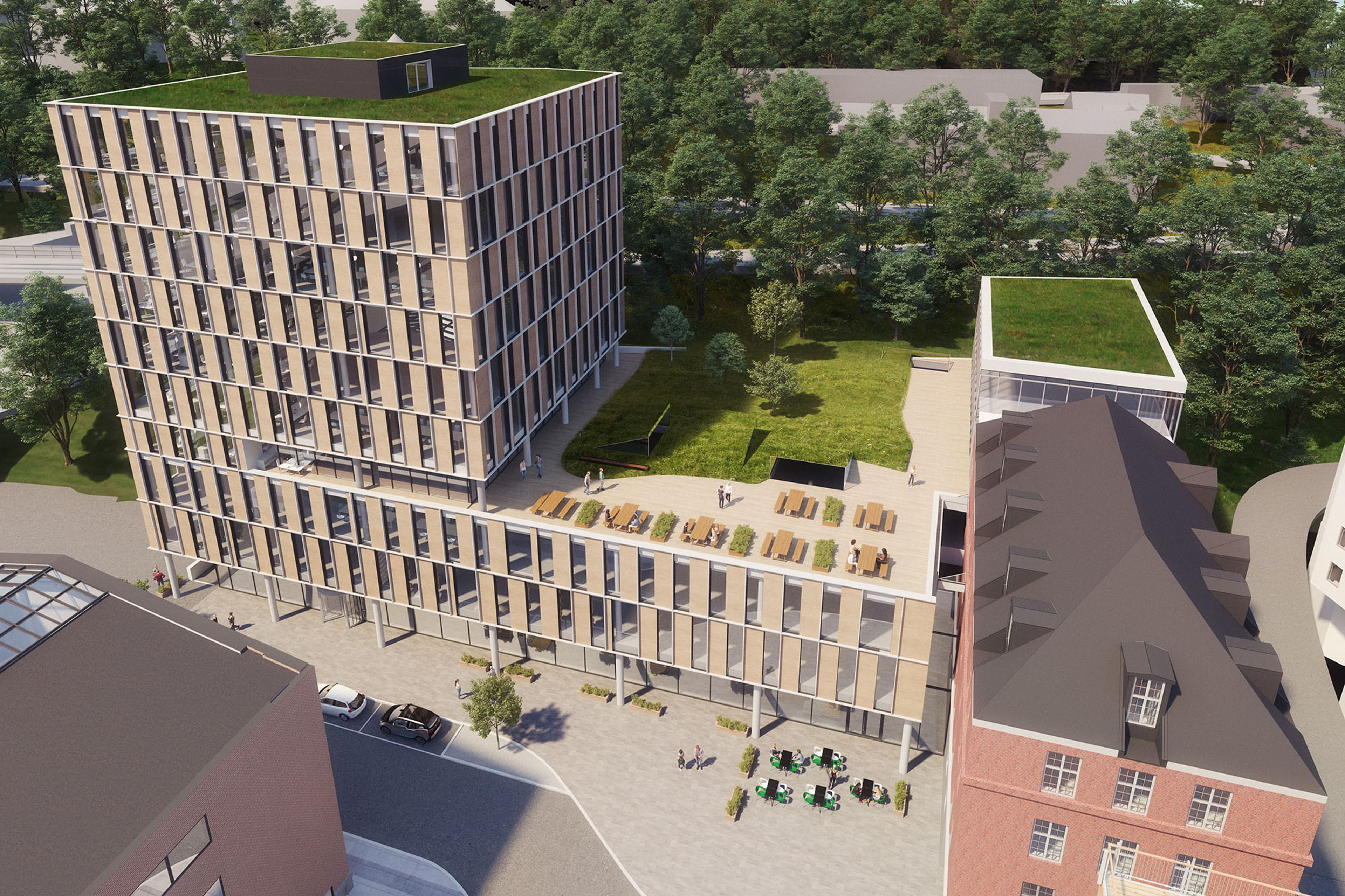 Illustrasjonsfoto i fugleperspektiv av eiendommen og takterrassen over tredje etasje i bygget.