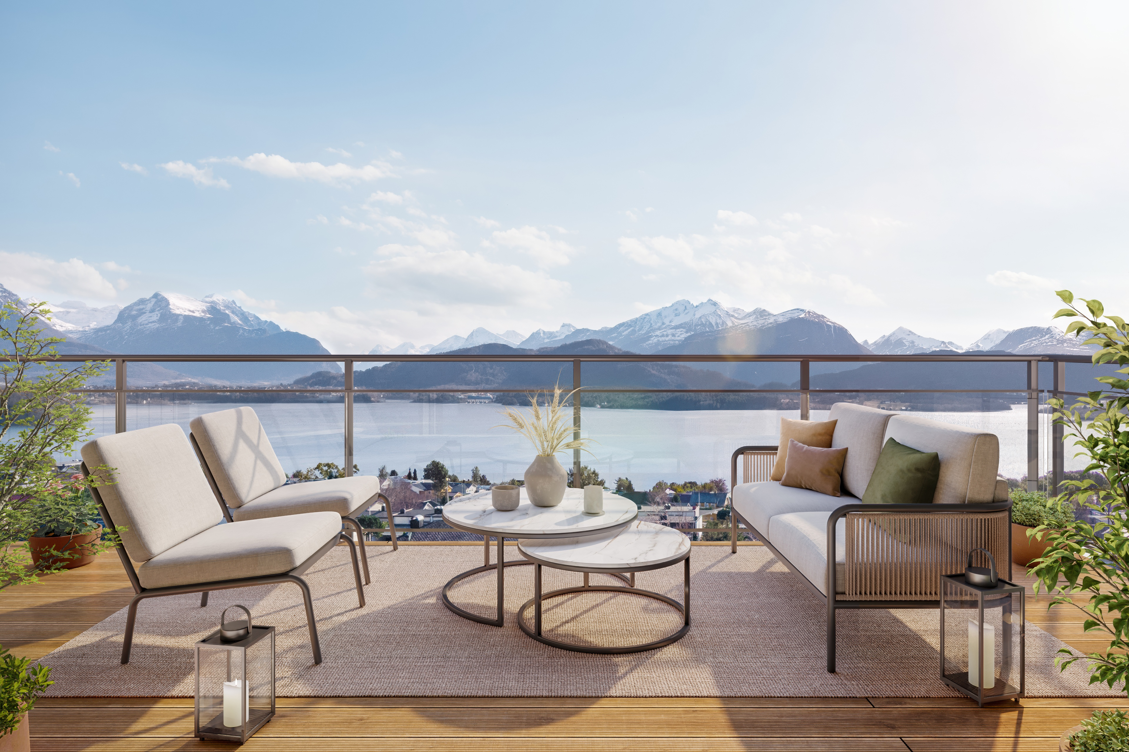 Utsikt fra leilighetsbalkong mot fjorden og Sunnmørsalpene.
