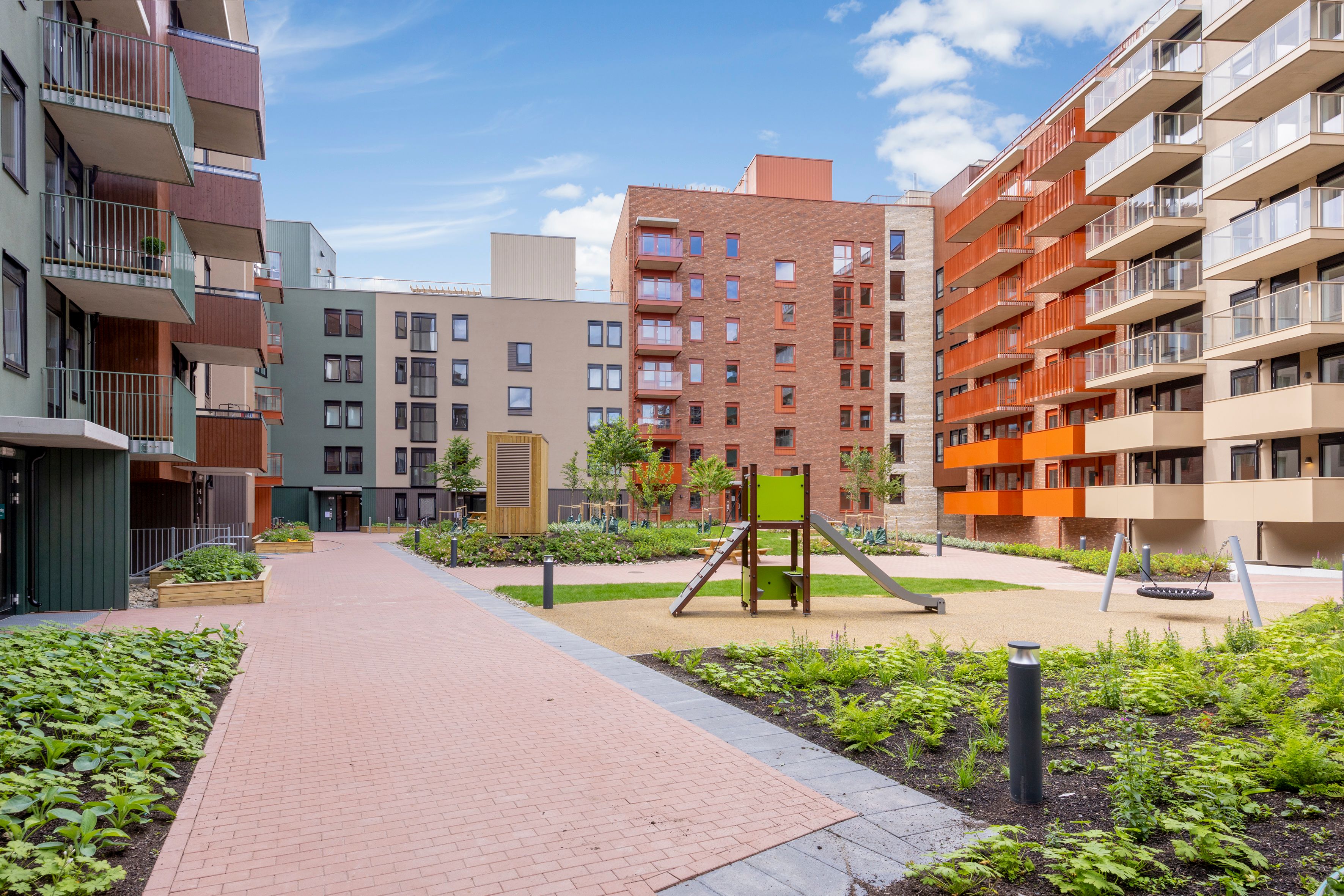 Foto av gårdsrom med lekeplass på Vollebekk