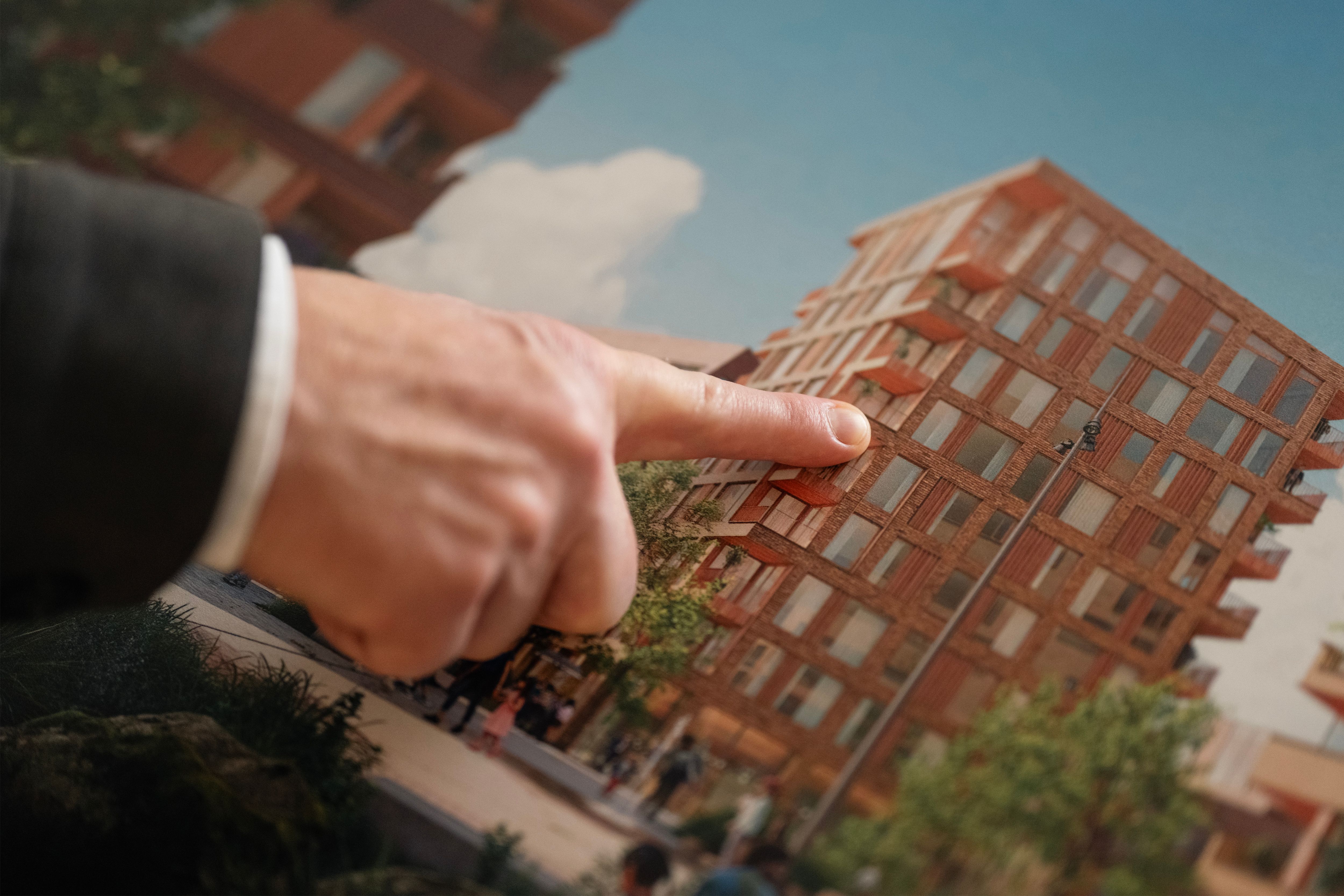 Hånd som peker på illustrasjon