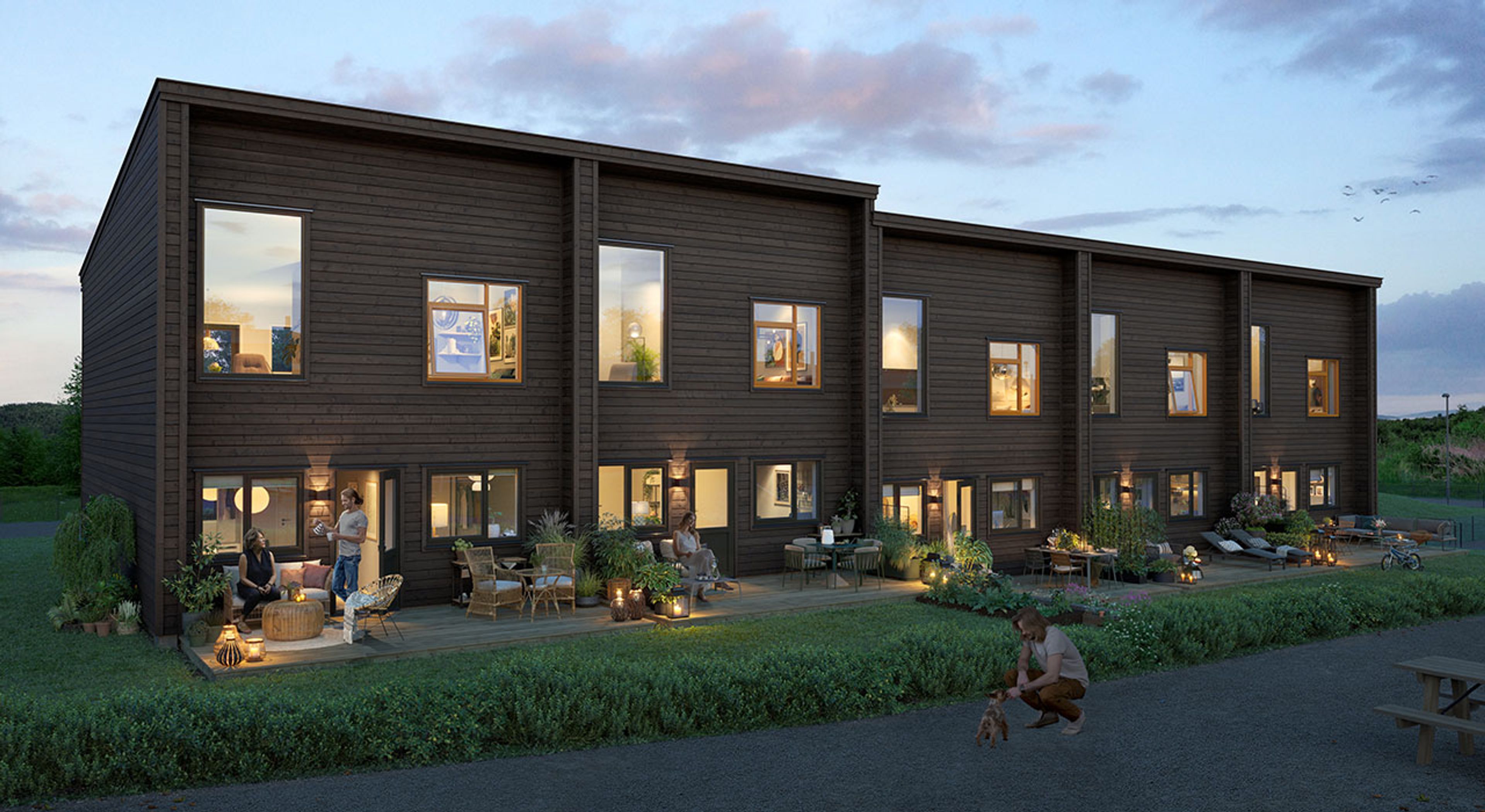 Illustrasjon av fasade på rekkehus på Lundestølen BKS4 på kveldstid