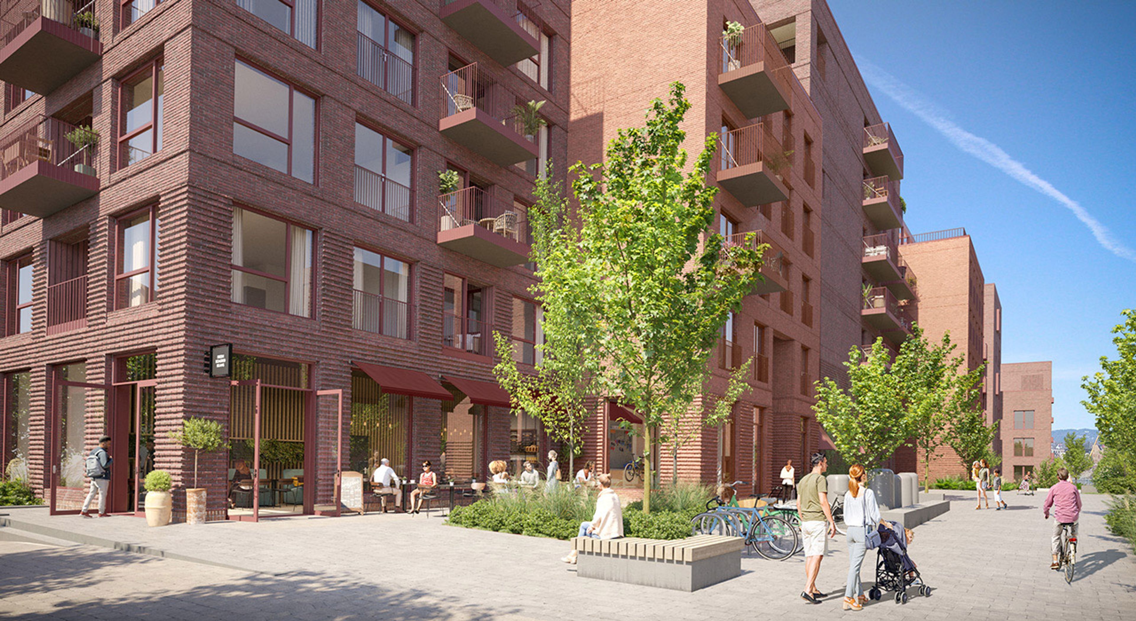 Gågate på Nansenløkka med leilighetene i bakgrunn.