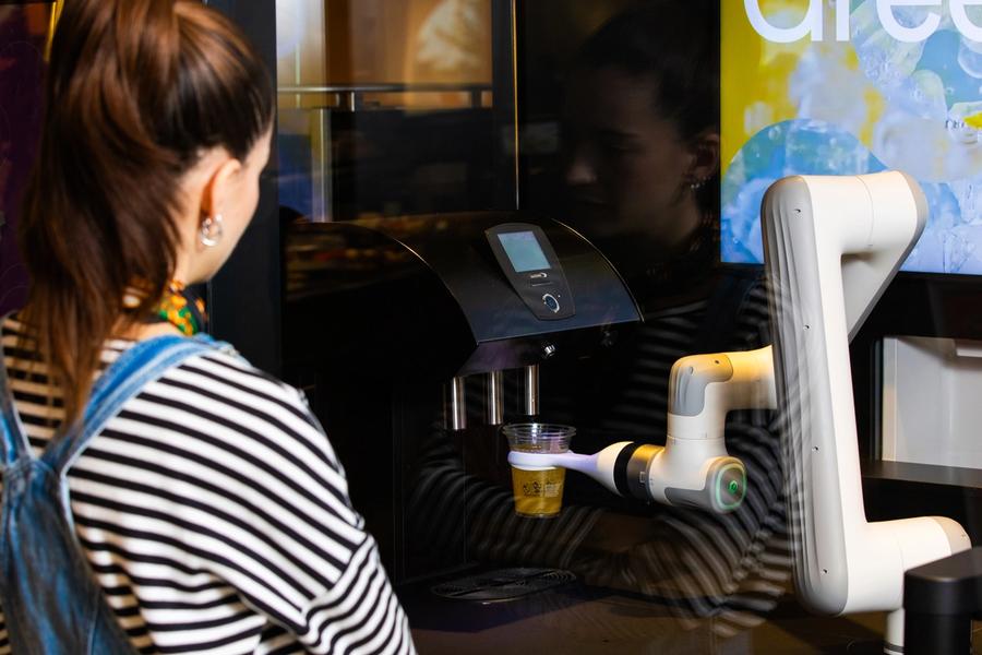 The Swiss Robobarista is often compared to a vending machine. Here is the real difference in menu, quality, and business model.