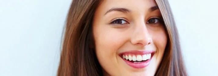 Smiling woman with long brown hair