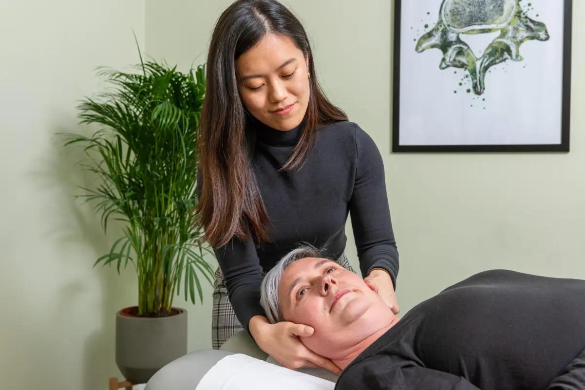 A practitioner demonstrating a technique at the Burton-on-Trent clinic
