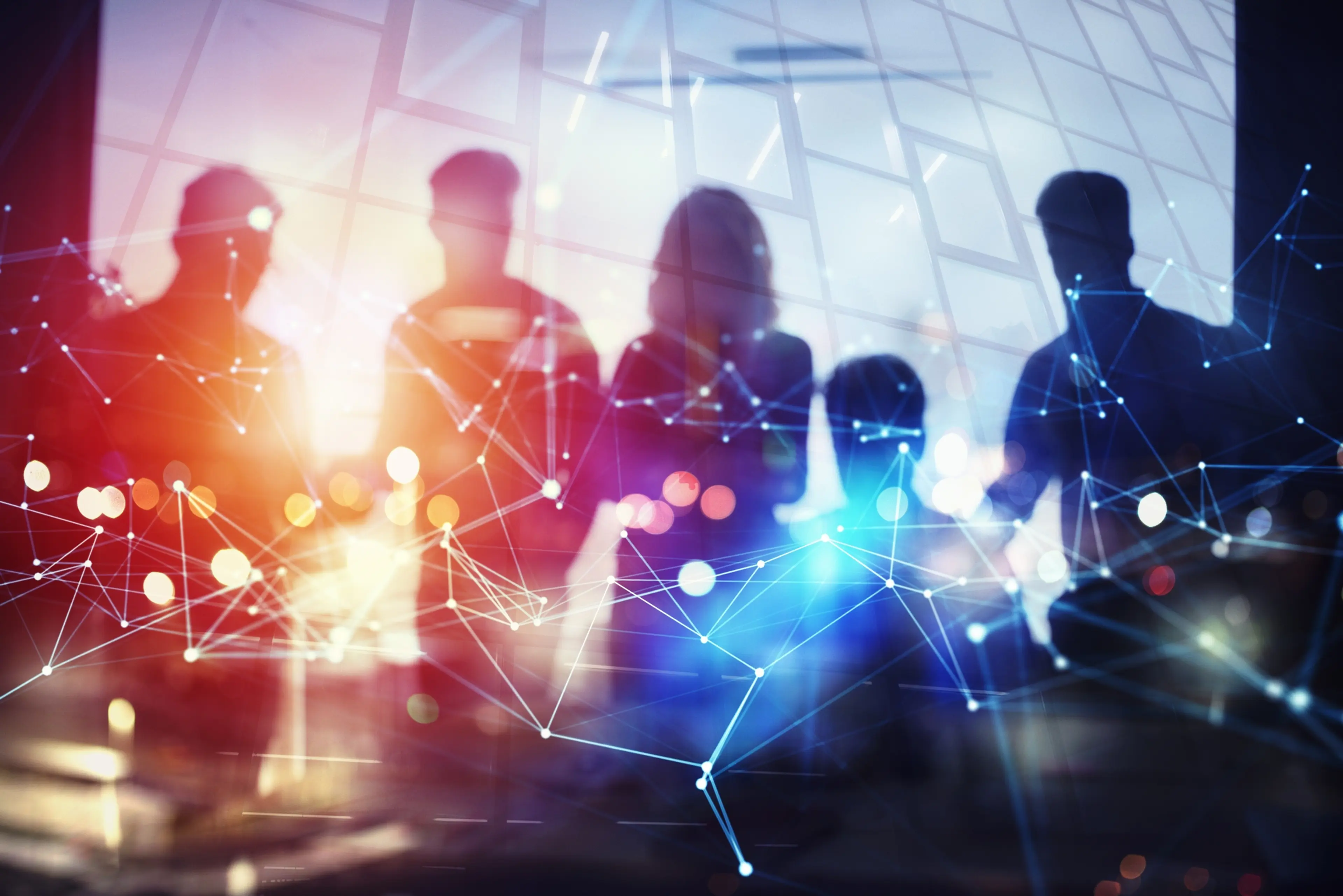 Silhouette of business people work together in office