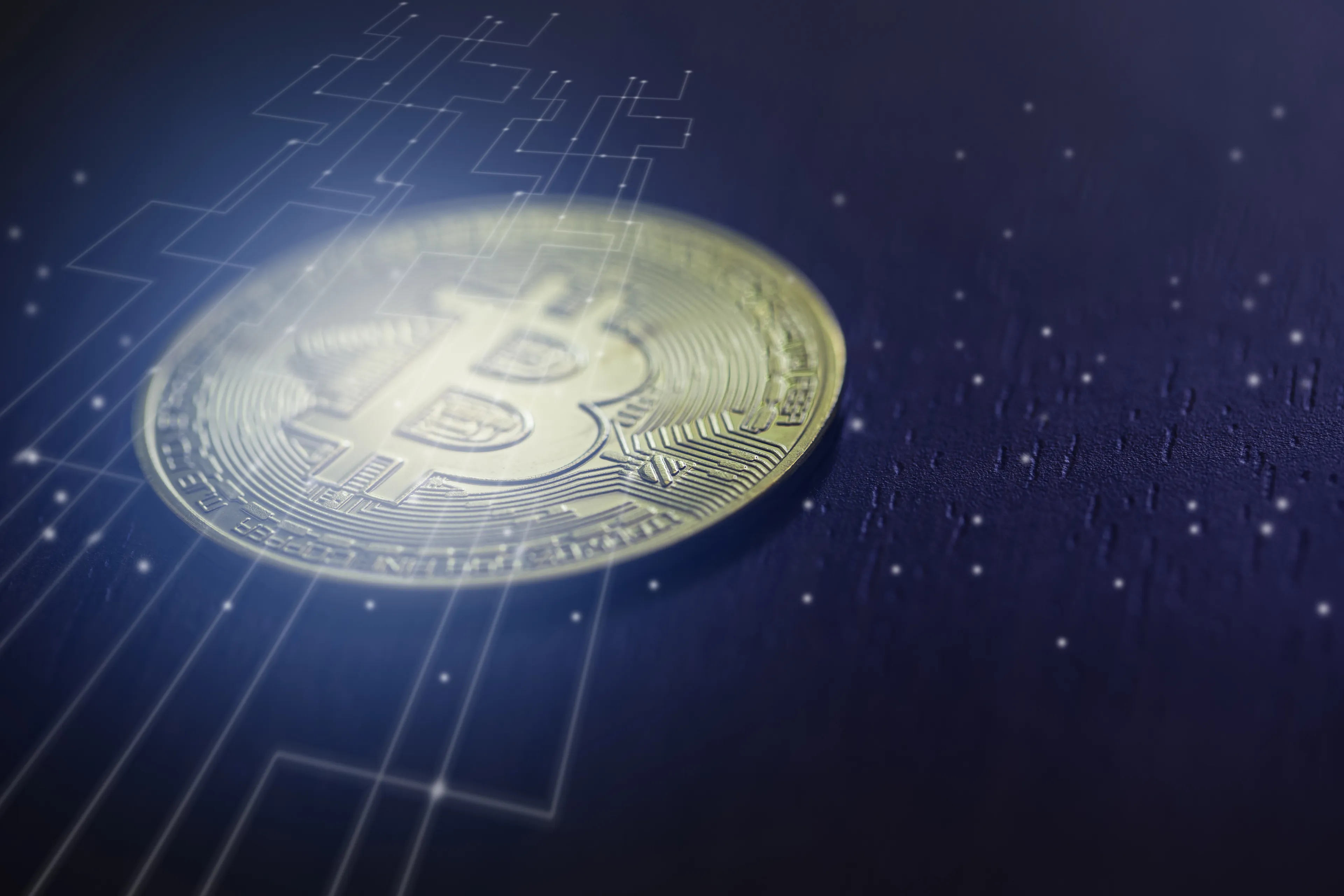 Image of Bitcoin on blue background