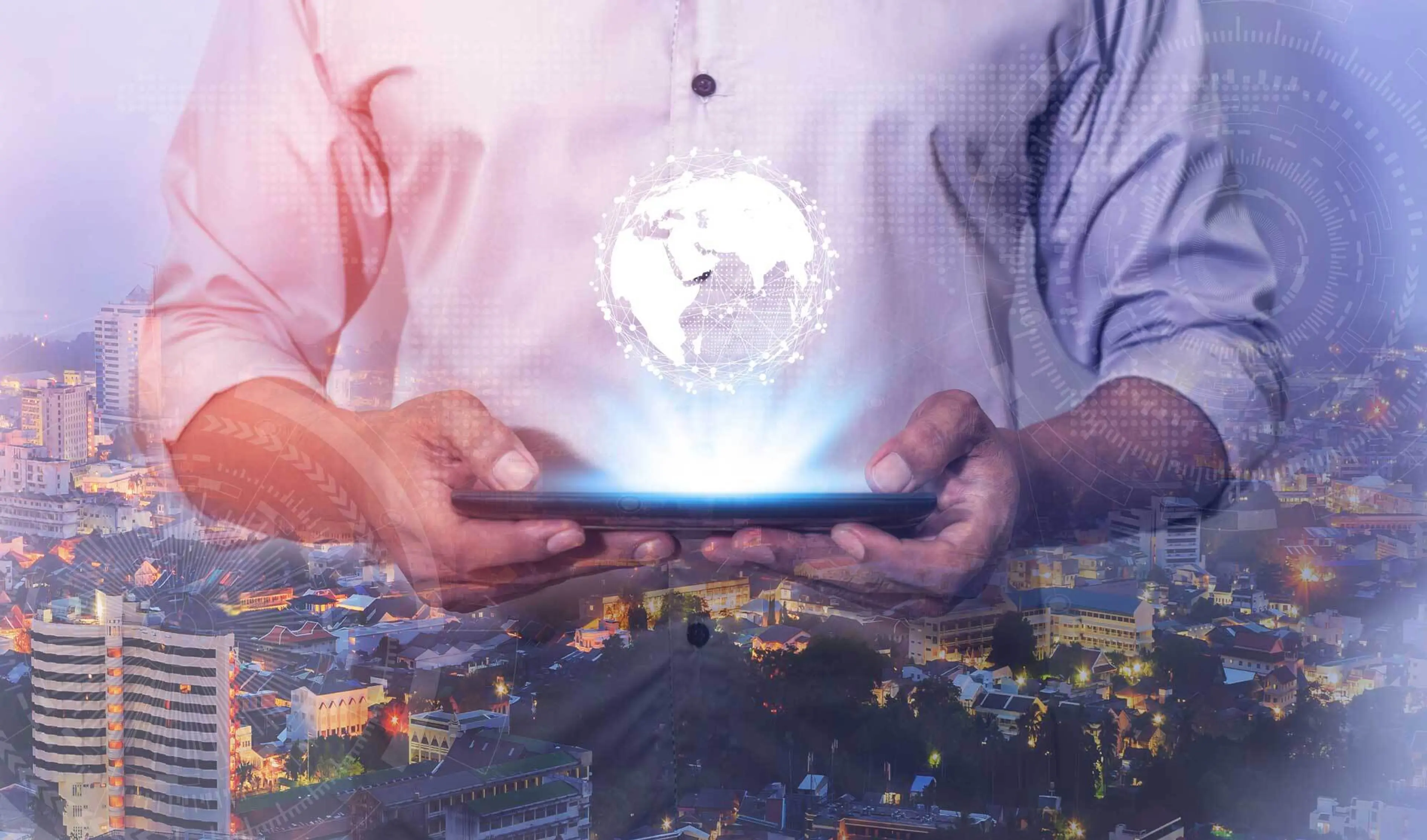 A neck high image of a man holding a tablet