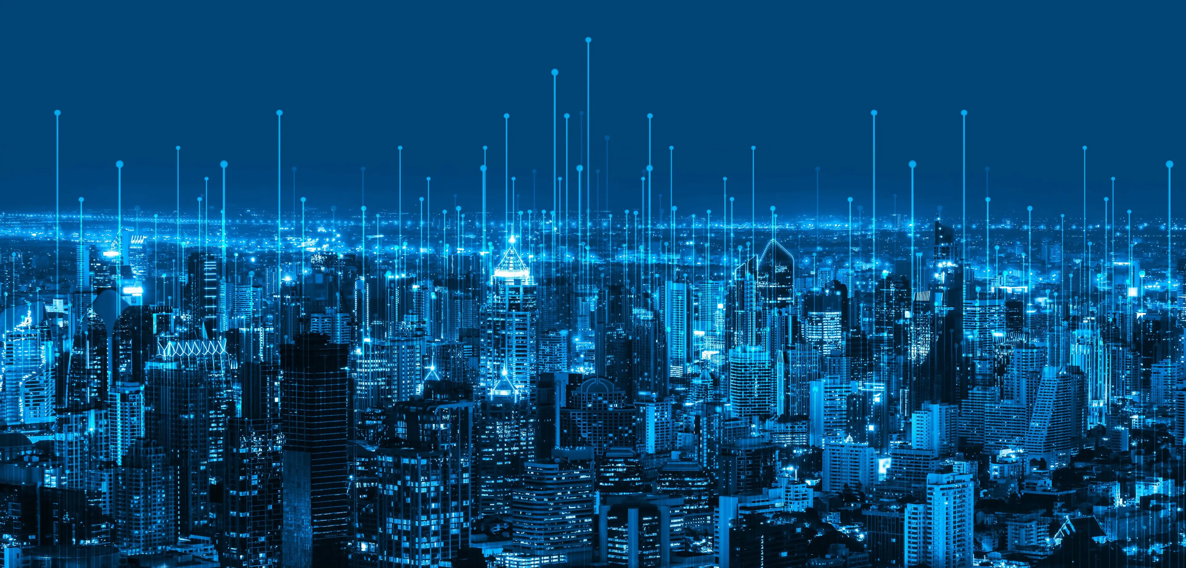 Aerial view of skyscraper buildings all shown in blue color