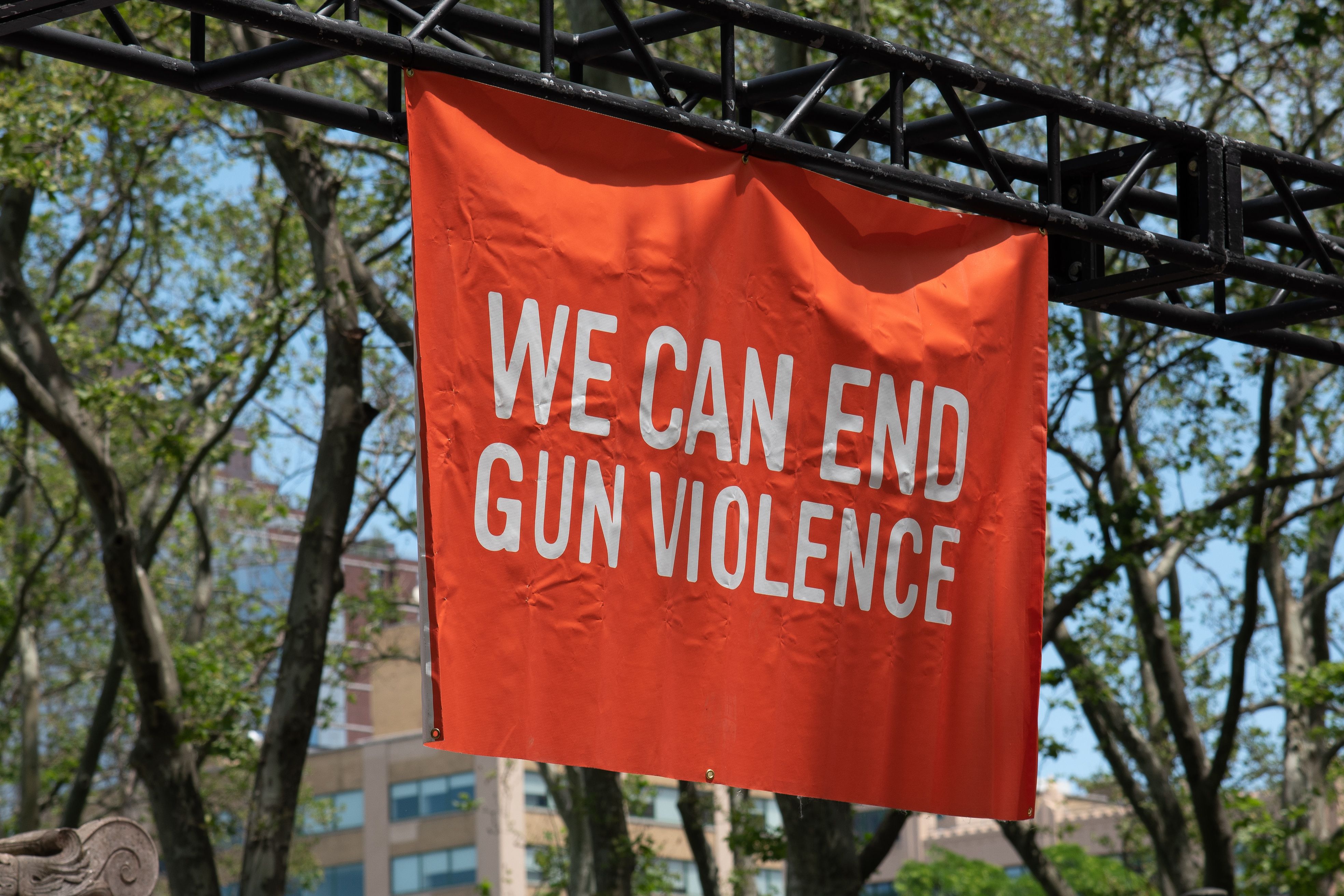 A banner that says we can end gun violence