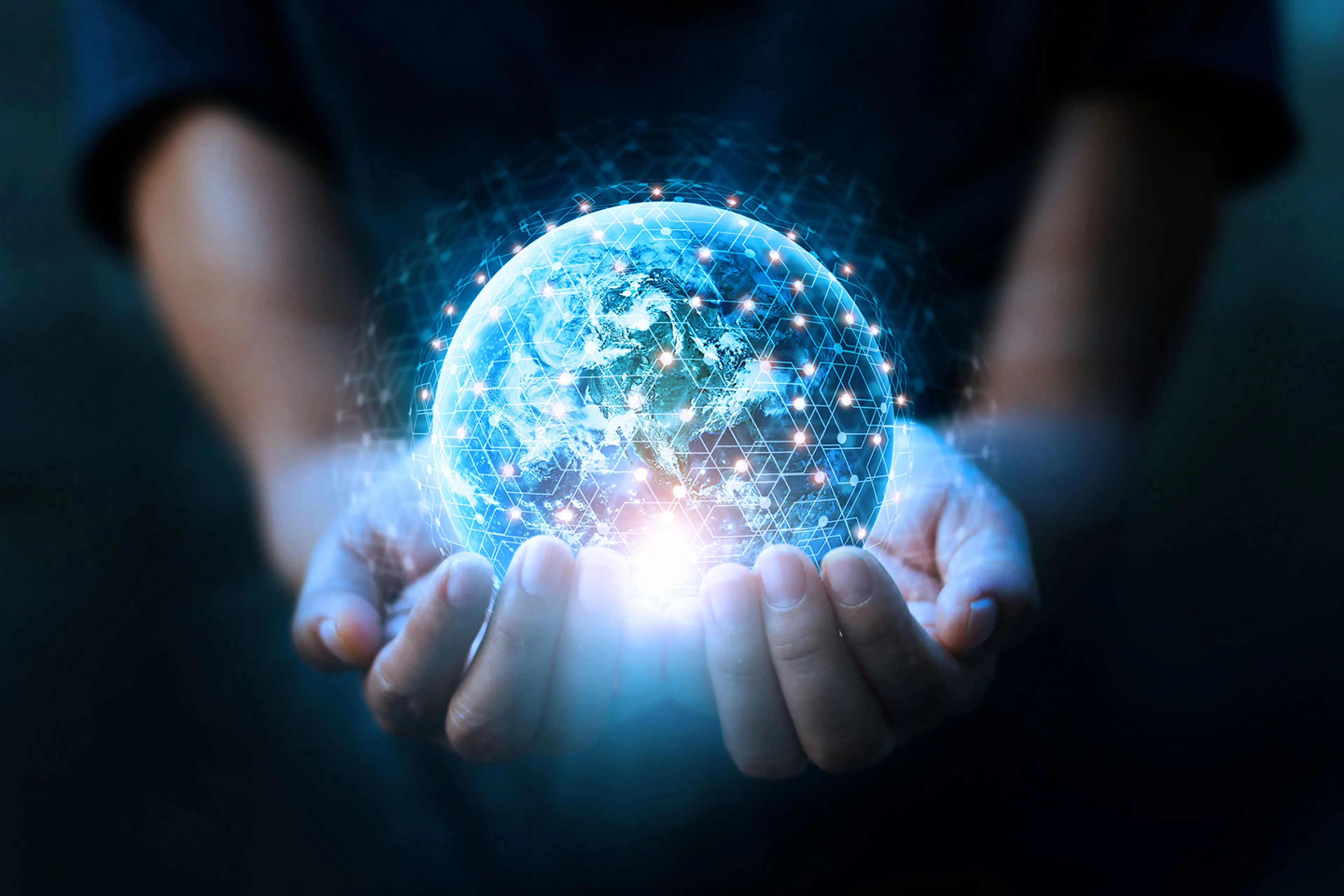 hands holding blue earth and global networking connection