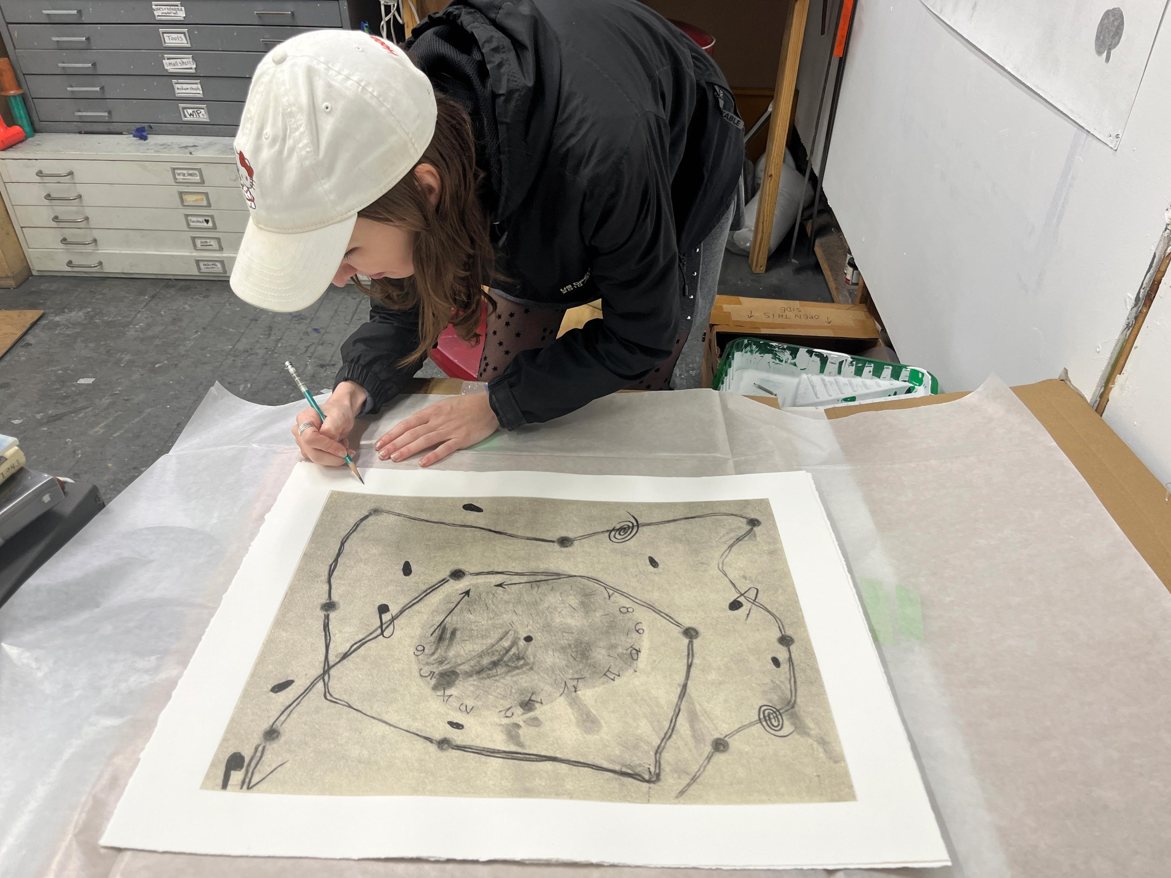 natalie signing a print